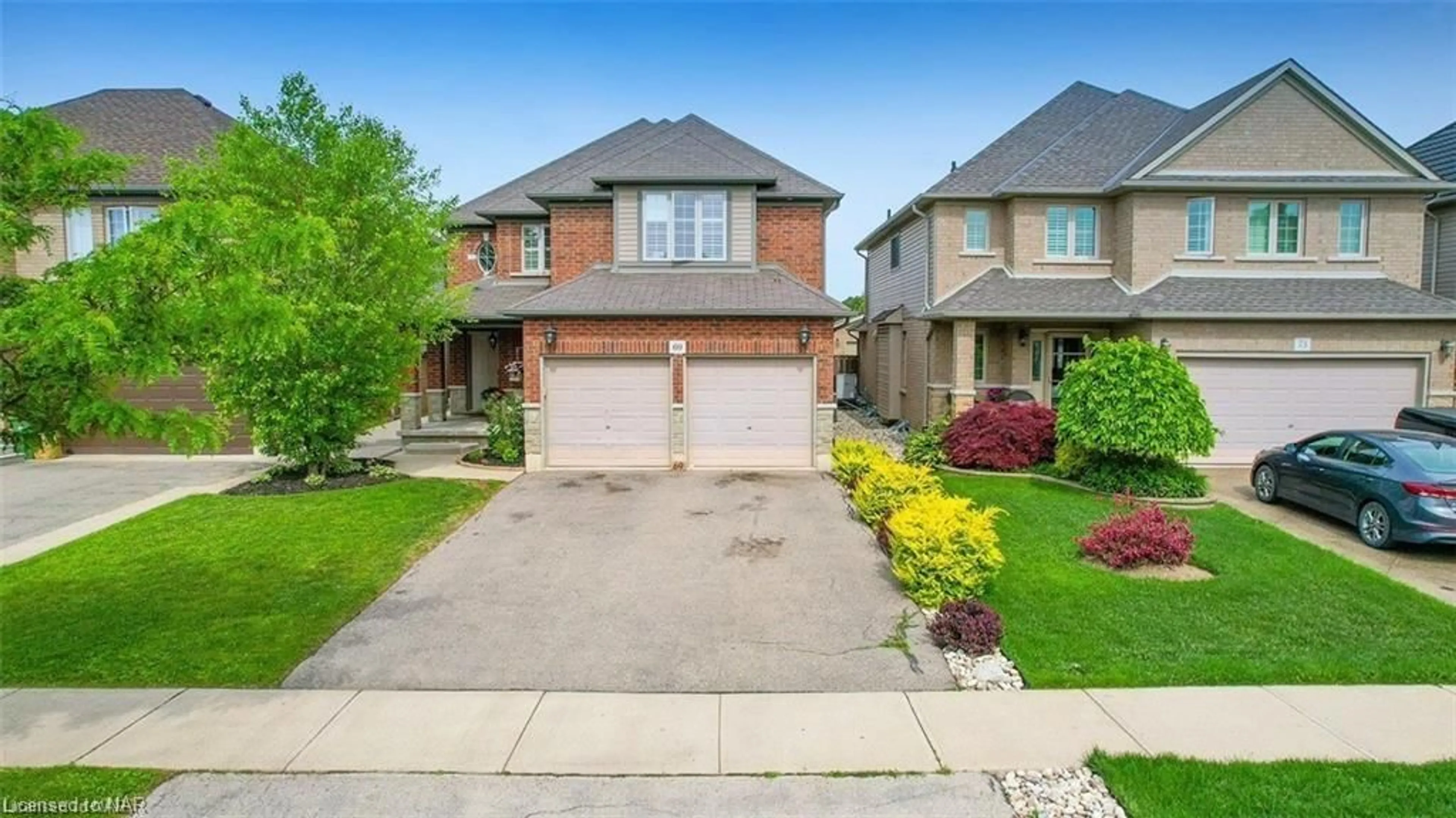 Frontside or backside of a home for 69 Tanglewood Dr, Glanbrook Ontario L0R 1C0