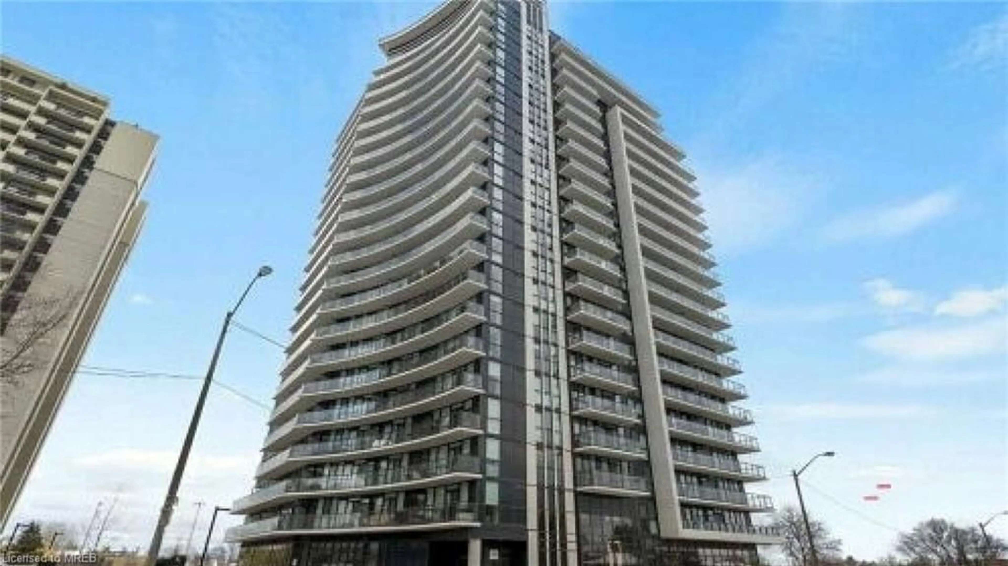 A pic from exterior of the house or condo, the front or back of building for 1461 Lawrence Ave #811, Toronto Ontario M6L 0A6