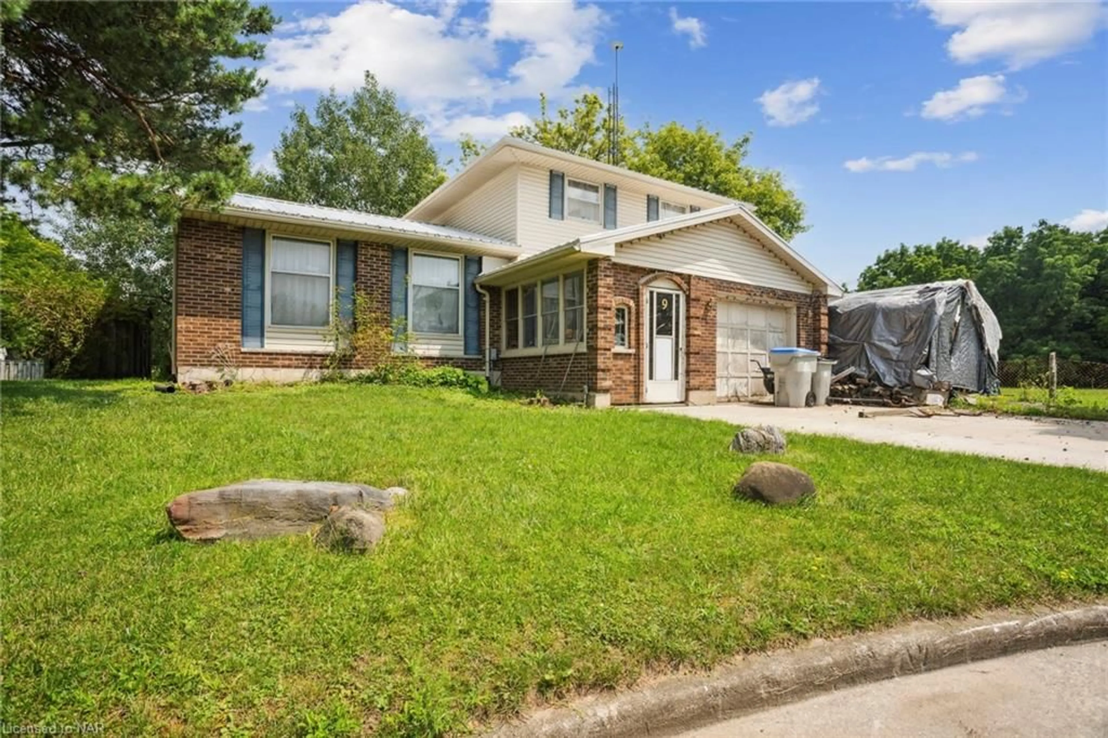 Frontside or backside of a home, the fenced backyard for 9 Juniper Pl, Forest Ontario N0N 1J0