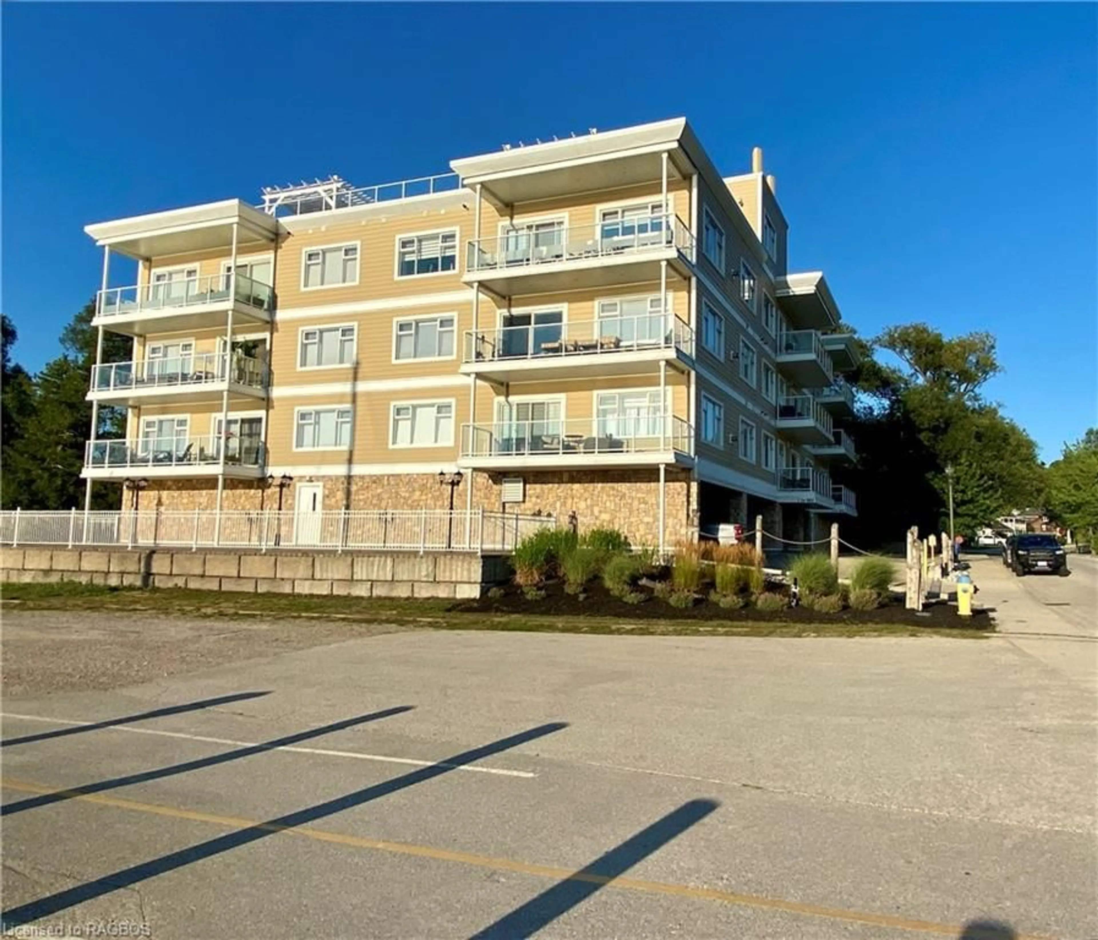 A pic from exterior of the house or condo, the street view for 137 Elgin St #303, Port Elgin Ontario N0H 2C2