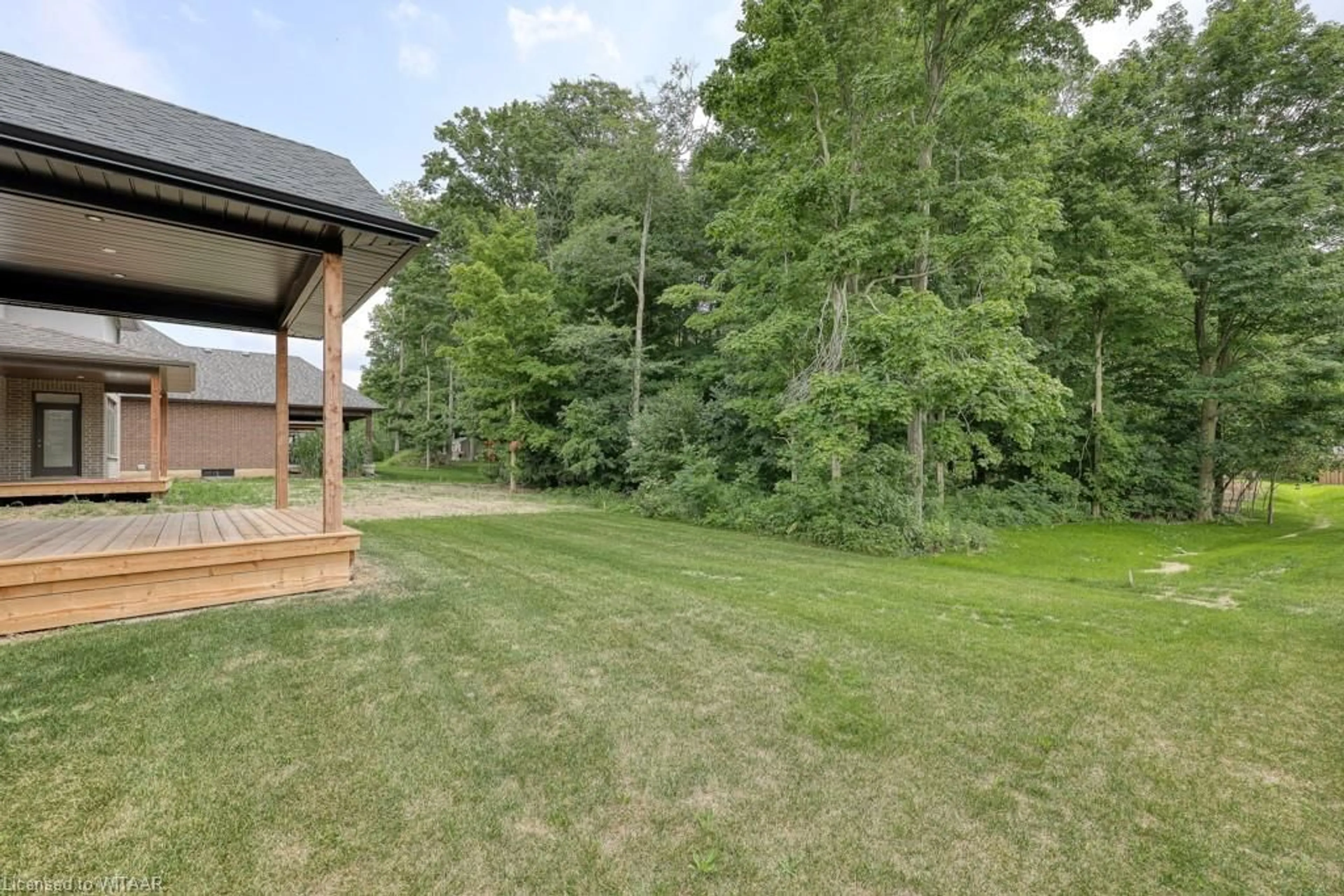 Patio, the fenced backyard for 61 Sunview Dr, Norwich Ontario N0J 1P0