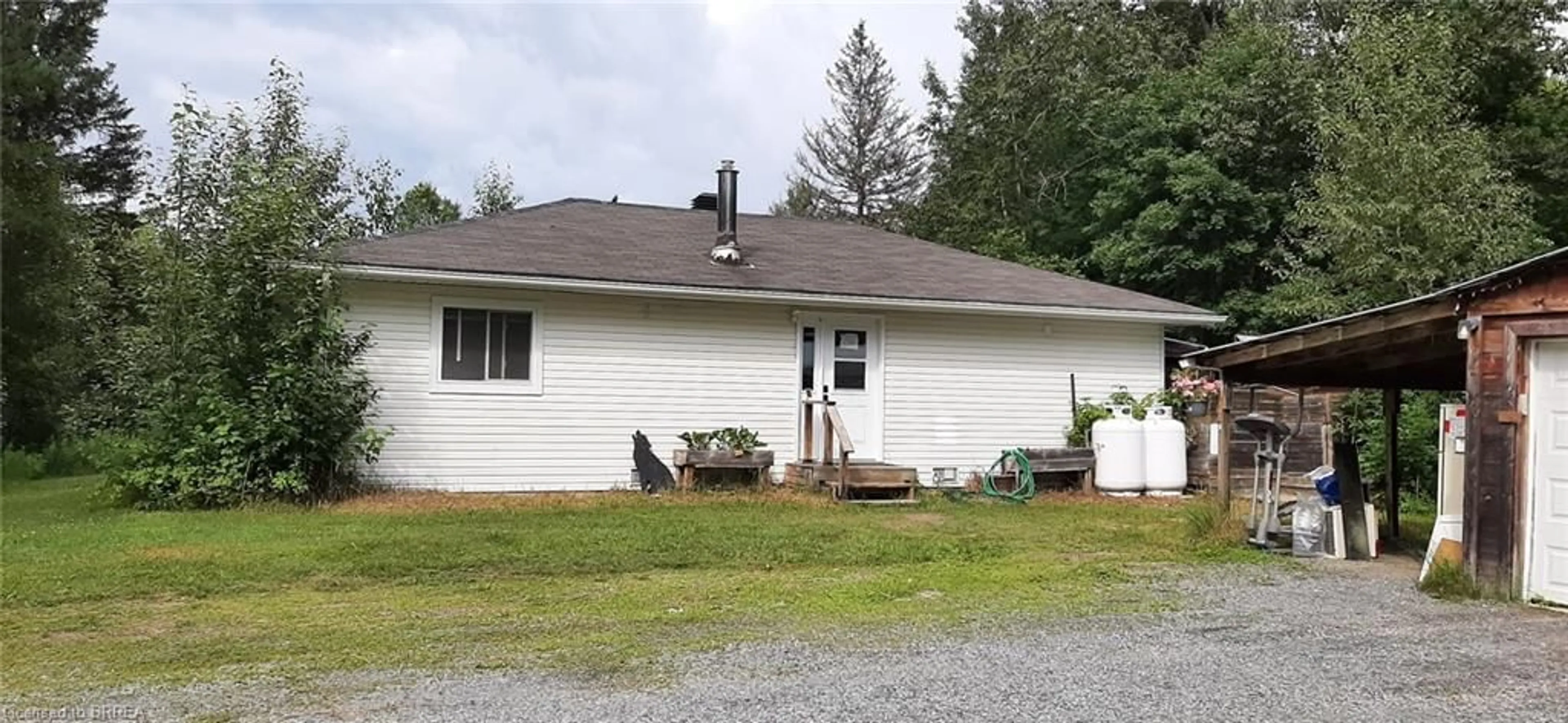 Frontside or backside of a home, cottage for 13356 64 Hwy, Field Ontario P0H 1M0