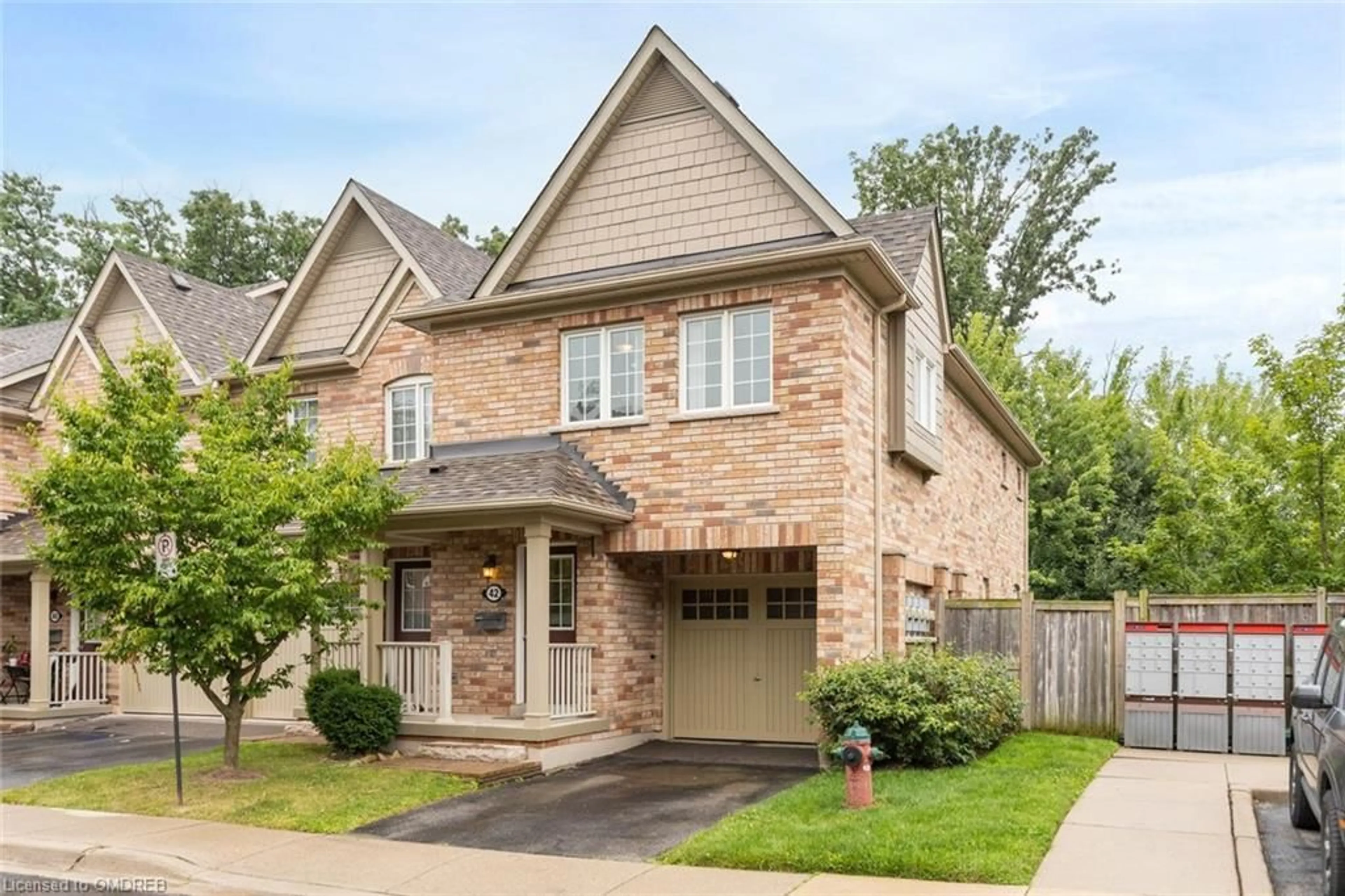 Home with brick exterior material for 233 Duskywing Way #42, Oakville Ontario L6L 0C5