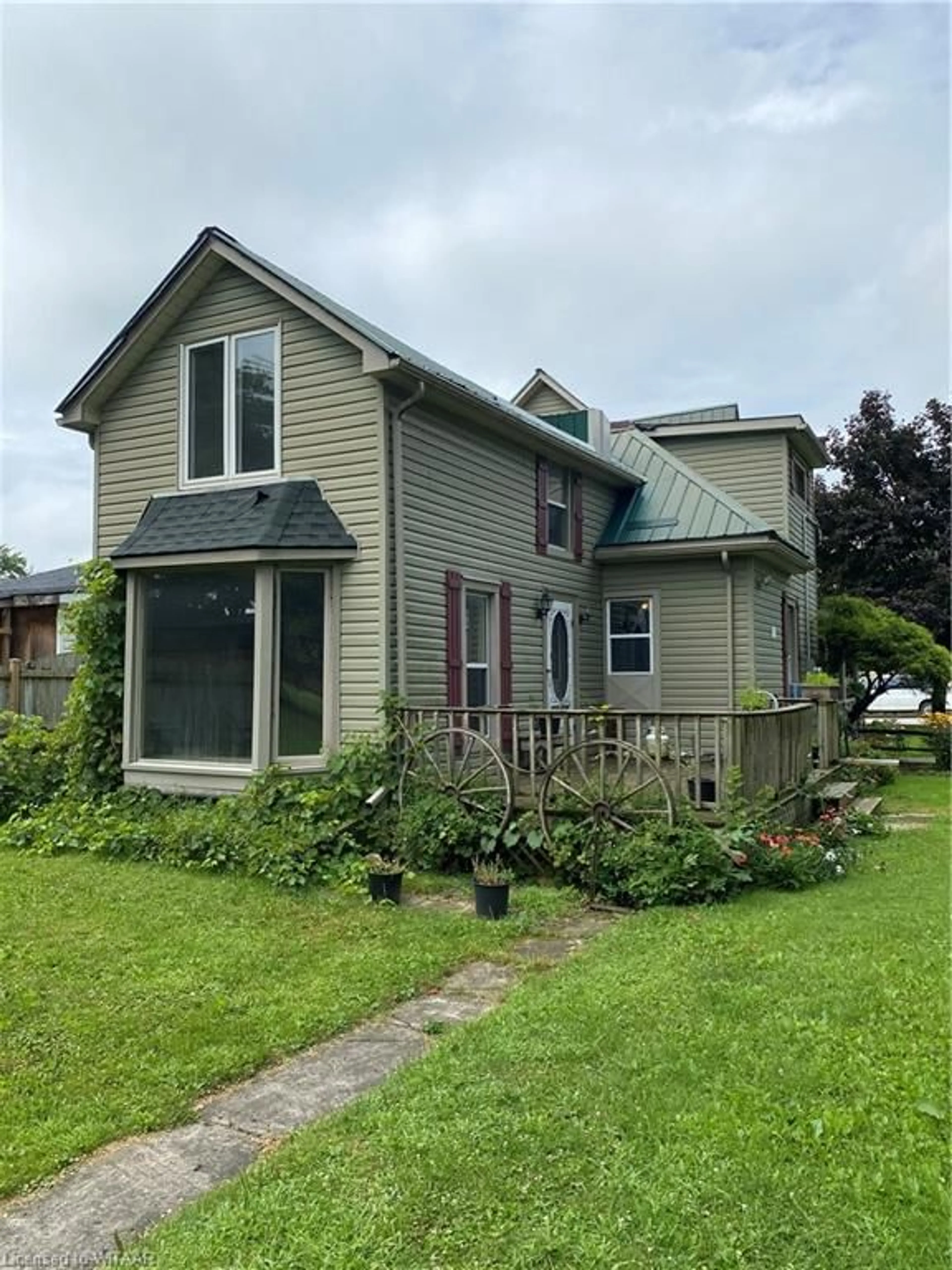 Frontside or backside of a home for 209 Main St, Otterville Ontario N0J 1R0