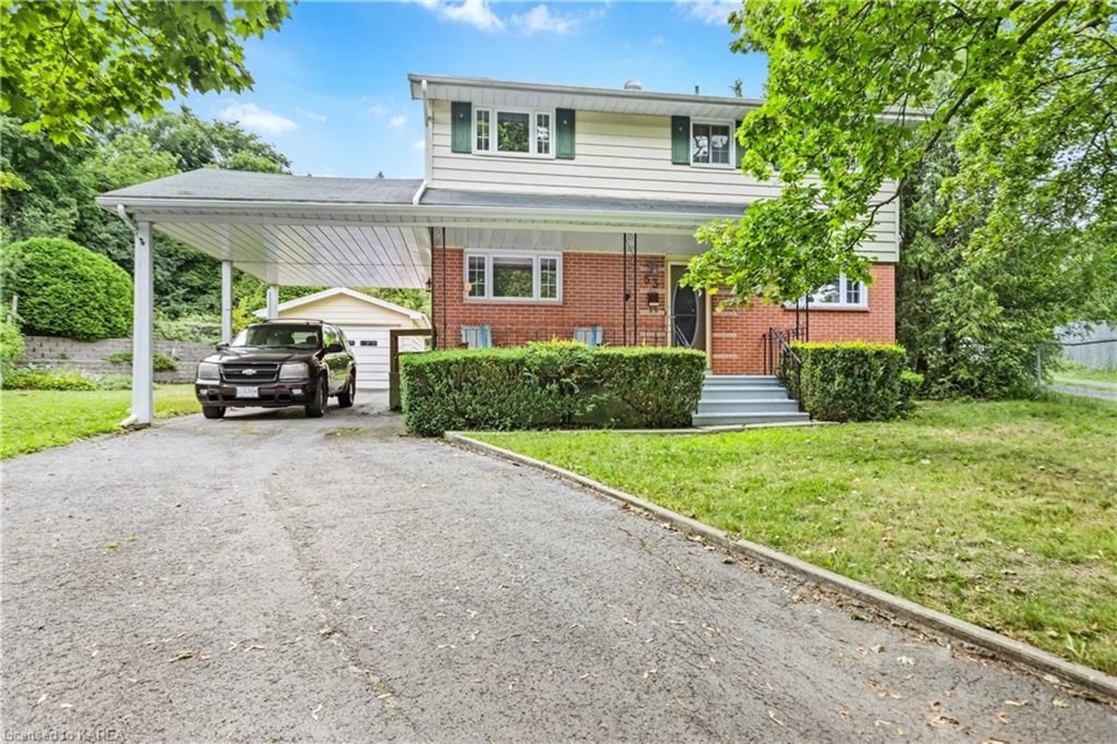 Frontside or backside of a home for 53 Hampstead Heath, Kingston Ontario K7M 3J1