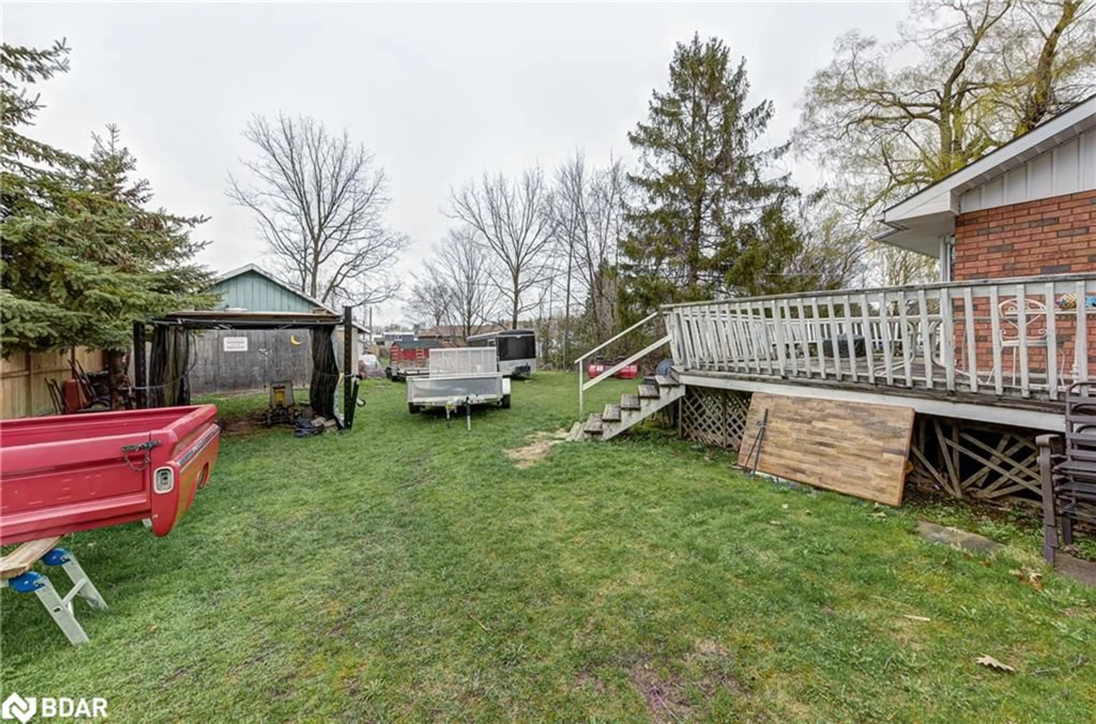 Patio, the fenced backyard for 7398 County Rd 91, Stayner Ontario L0M 1S0