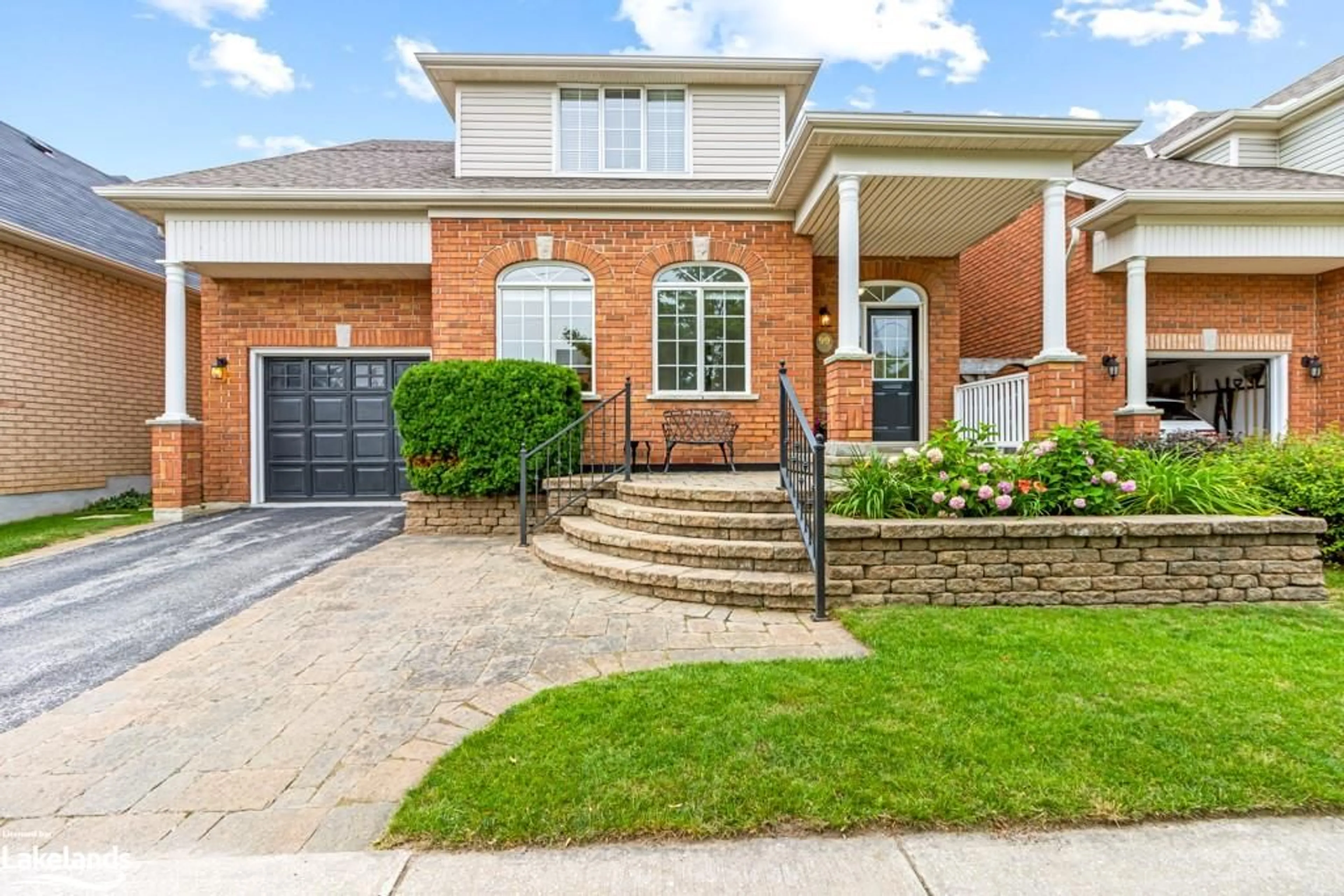 Home with brick exterior material for 99 Saint Paul St, Collingwood Ontario L9Y 3P1