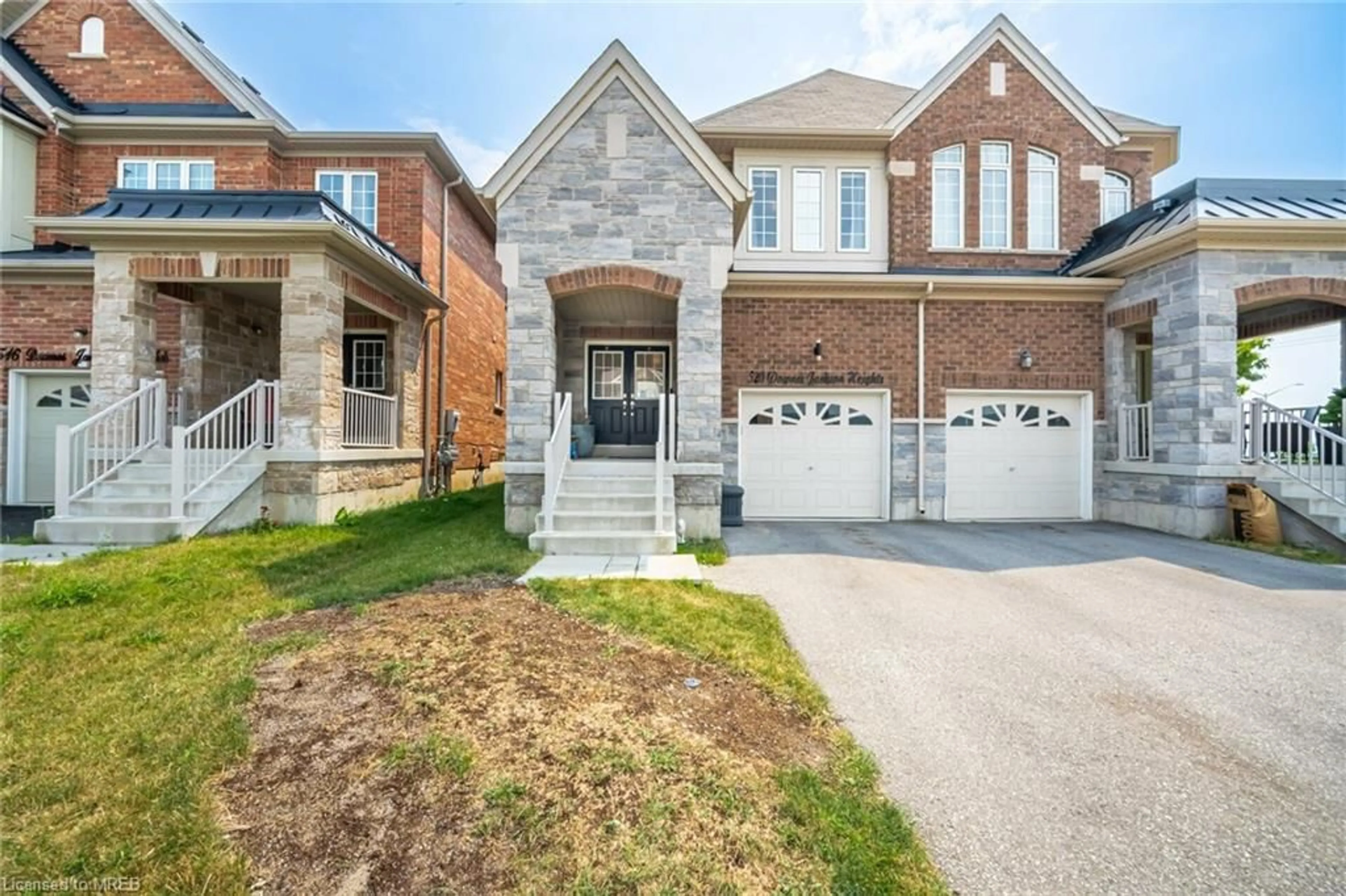 Home with brick exterior material for 520 Downes Jackson Hts, Milton Ontario L9T 8W2