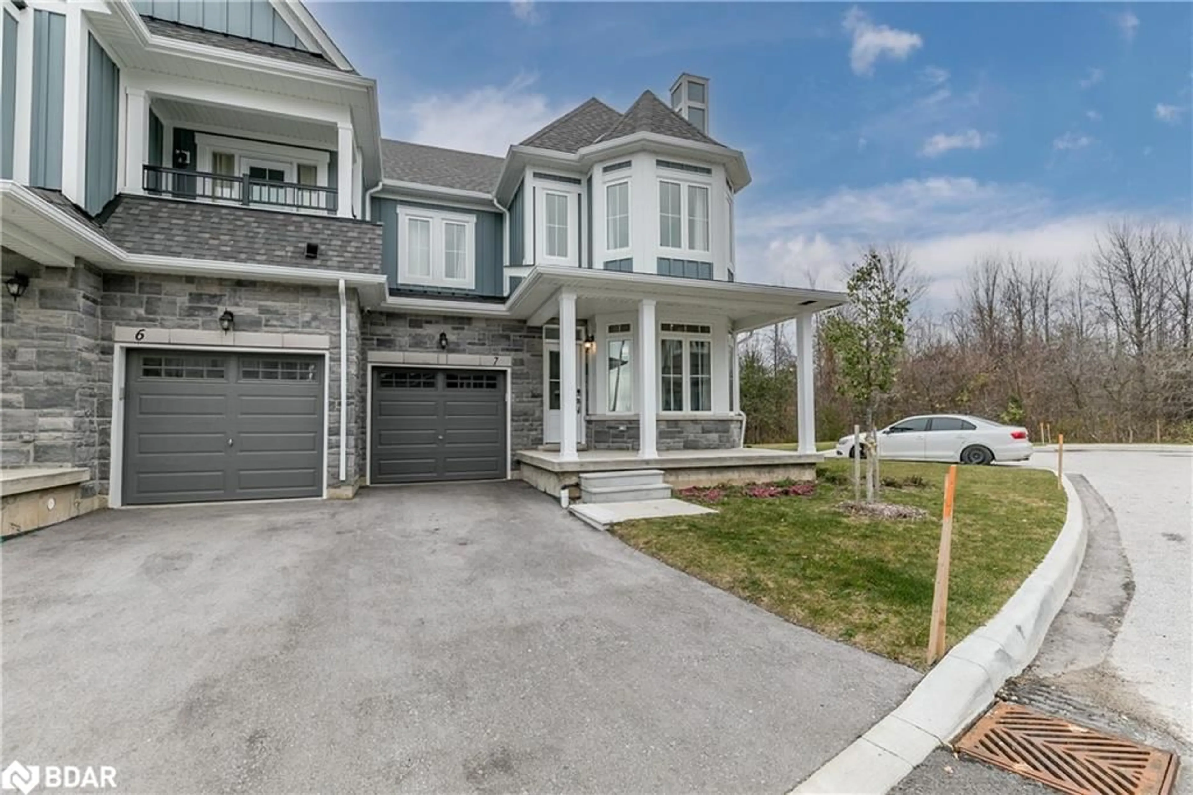 Frontside or backside of a home for 218 Crosswinds Blvd #7, The Blue Mountains Ontario L9Y 5S8