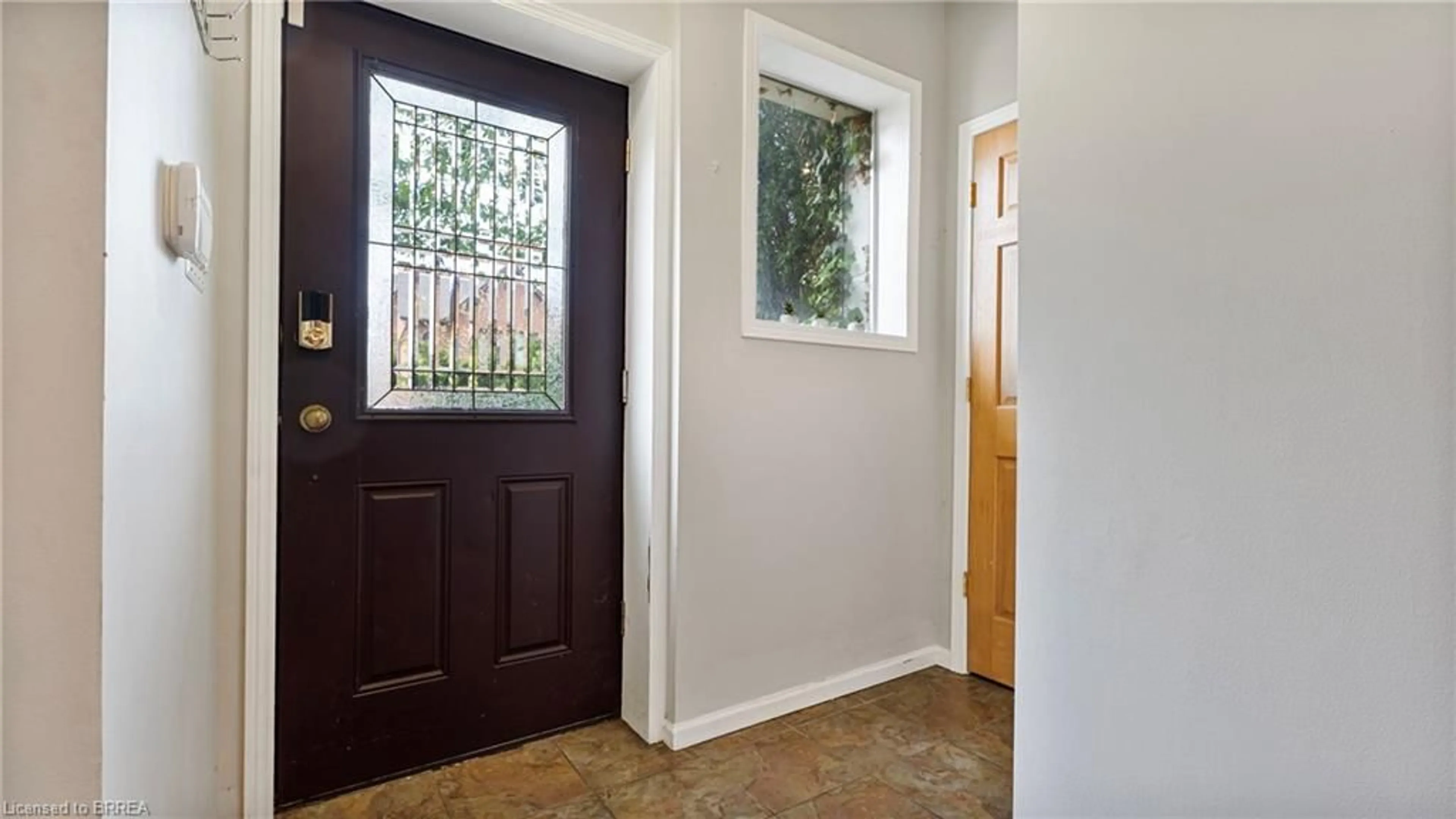 Indoor entryway, wood floors for 166 Hess St, Hamilton Ontario L8R 2T4