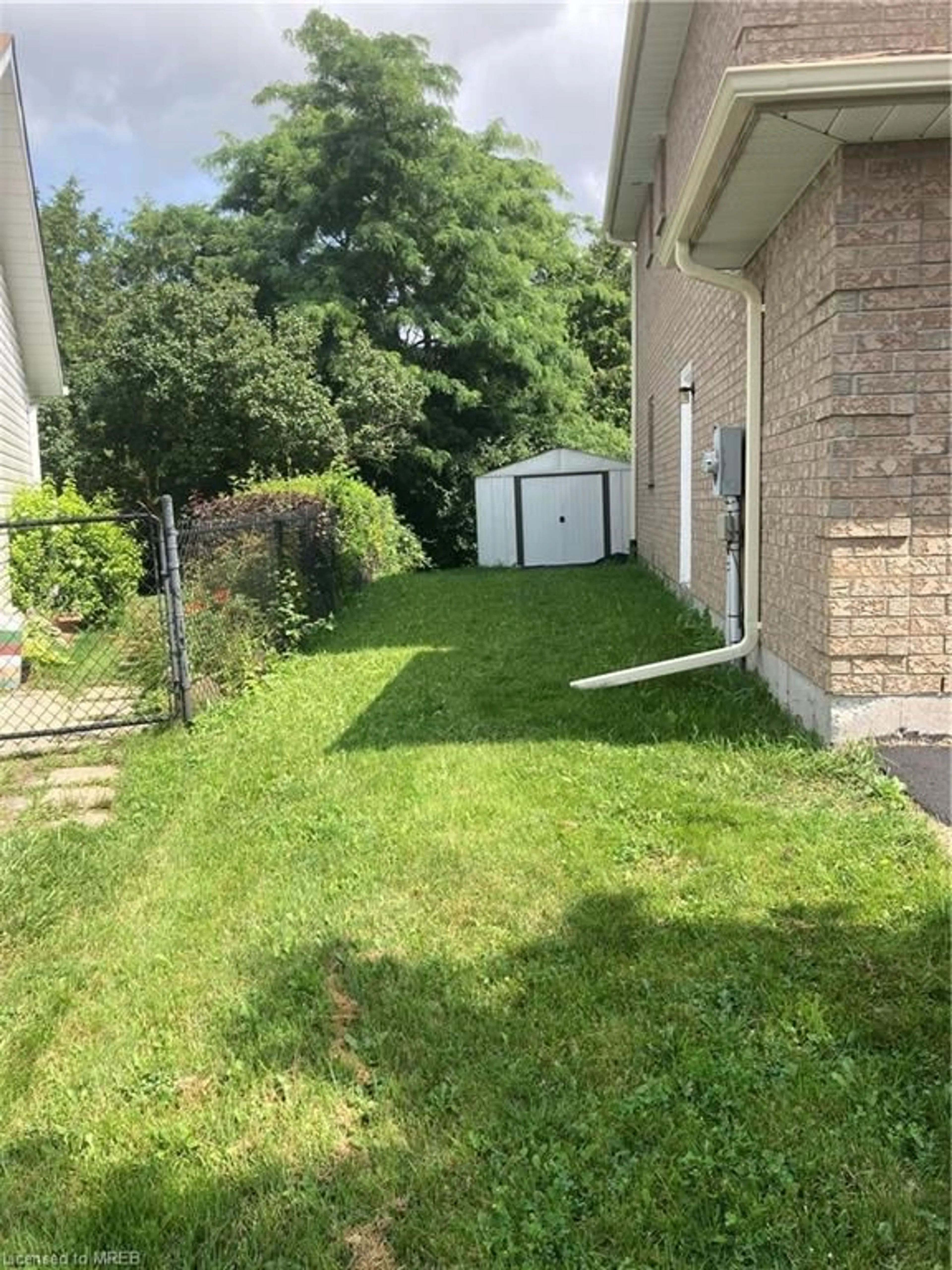 Frontside or backside of a home, the fenced backyard for 10 O'connell Crt, Lindsay Ontario K9V 5Y1