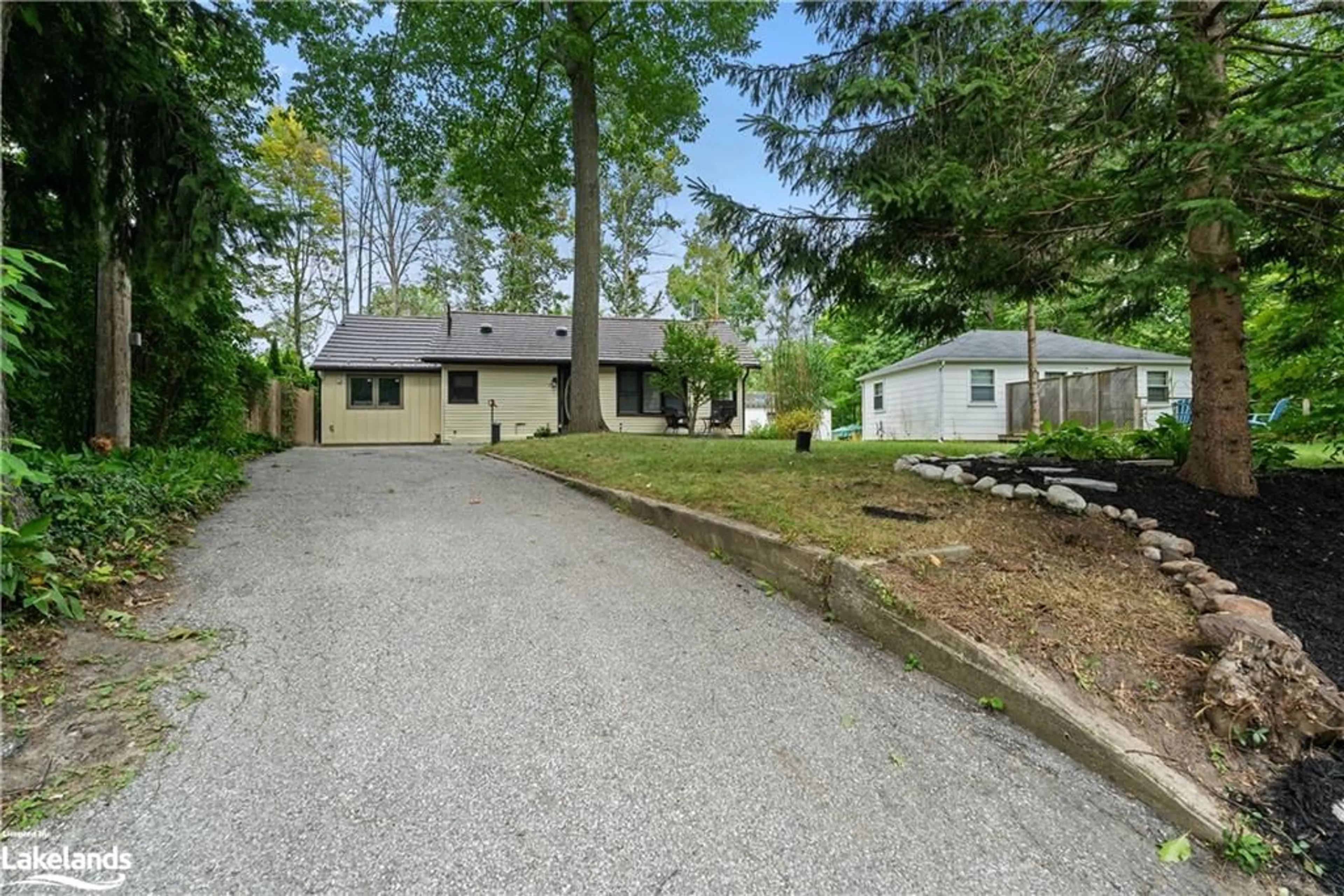 Frontside or backside of a home, cottage for 1941 Tiny Beaches Rd, Tiny Twp Ontario L0L 1P1