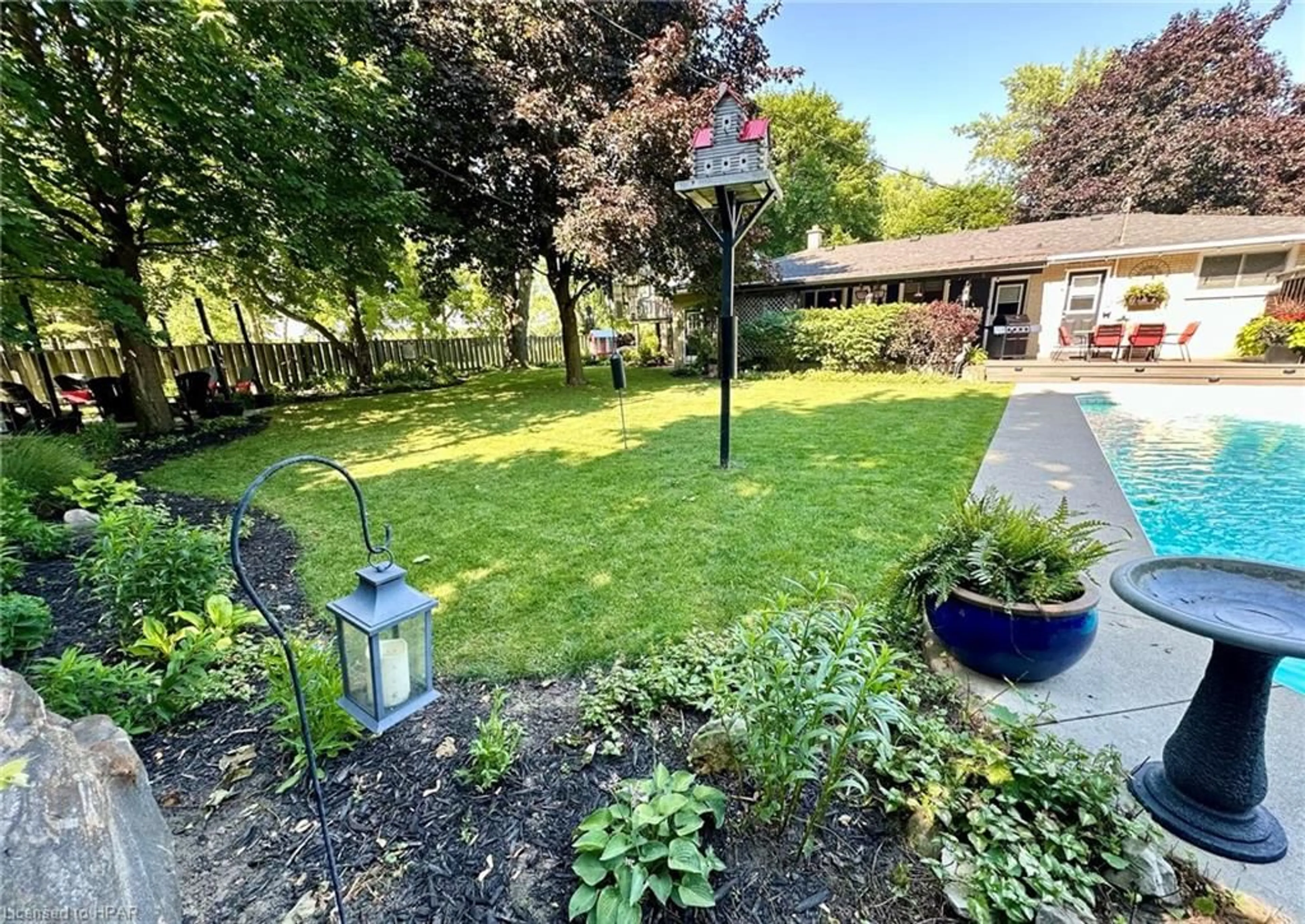 Patio, the fenced backyard for 213 Pryde Blvd, Exeter Ontario N0M 1S1