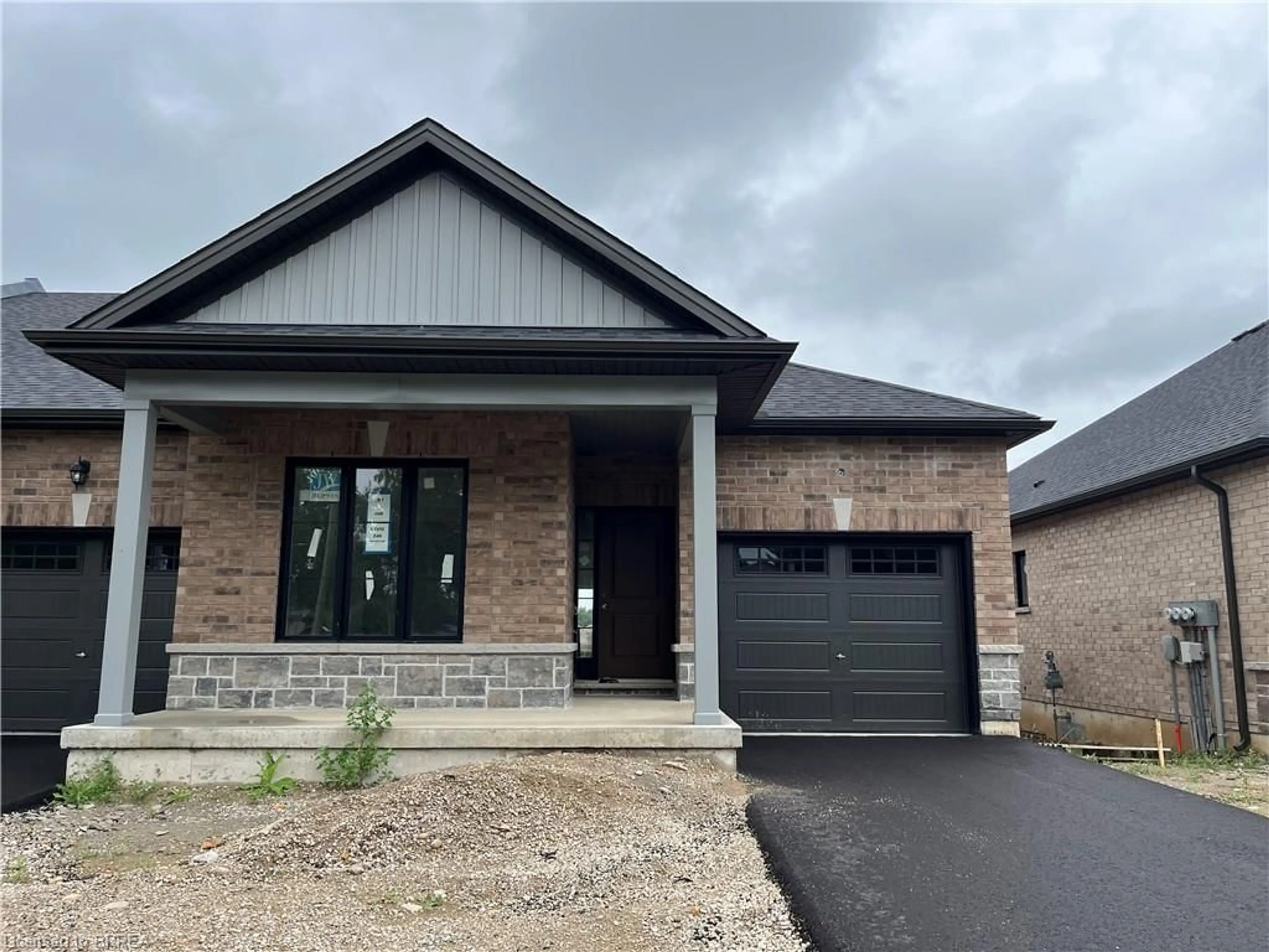 Home with brick exterior material for 240 Middleton St, Thamesford Ontario N0M 2M0