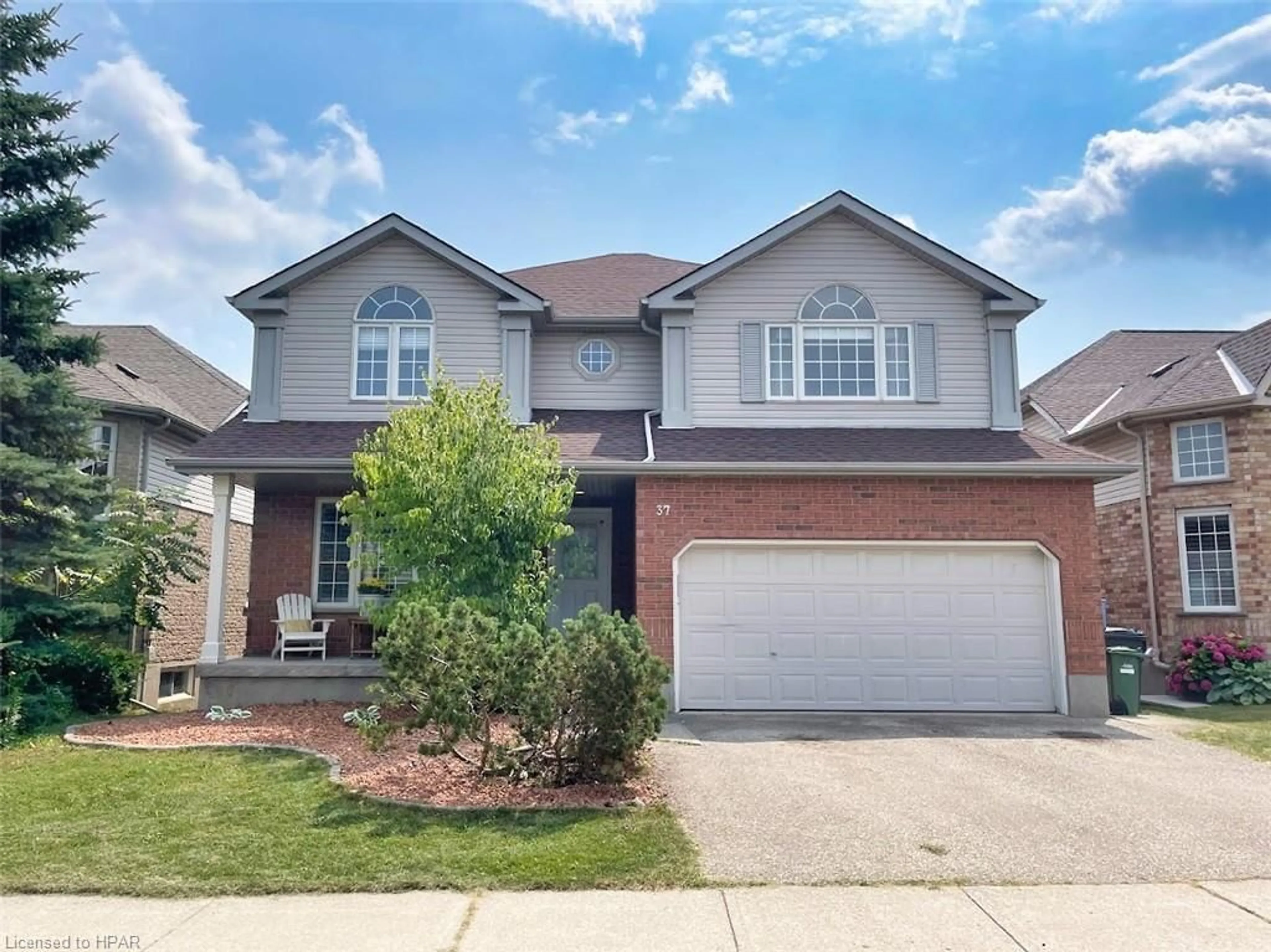 Frontside or backside of a home, the street view for 37 Grey Oak Dr, Guelph Ontario N1L 1P3