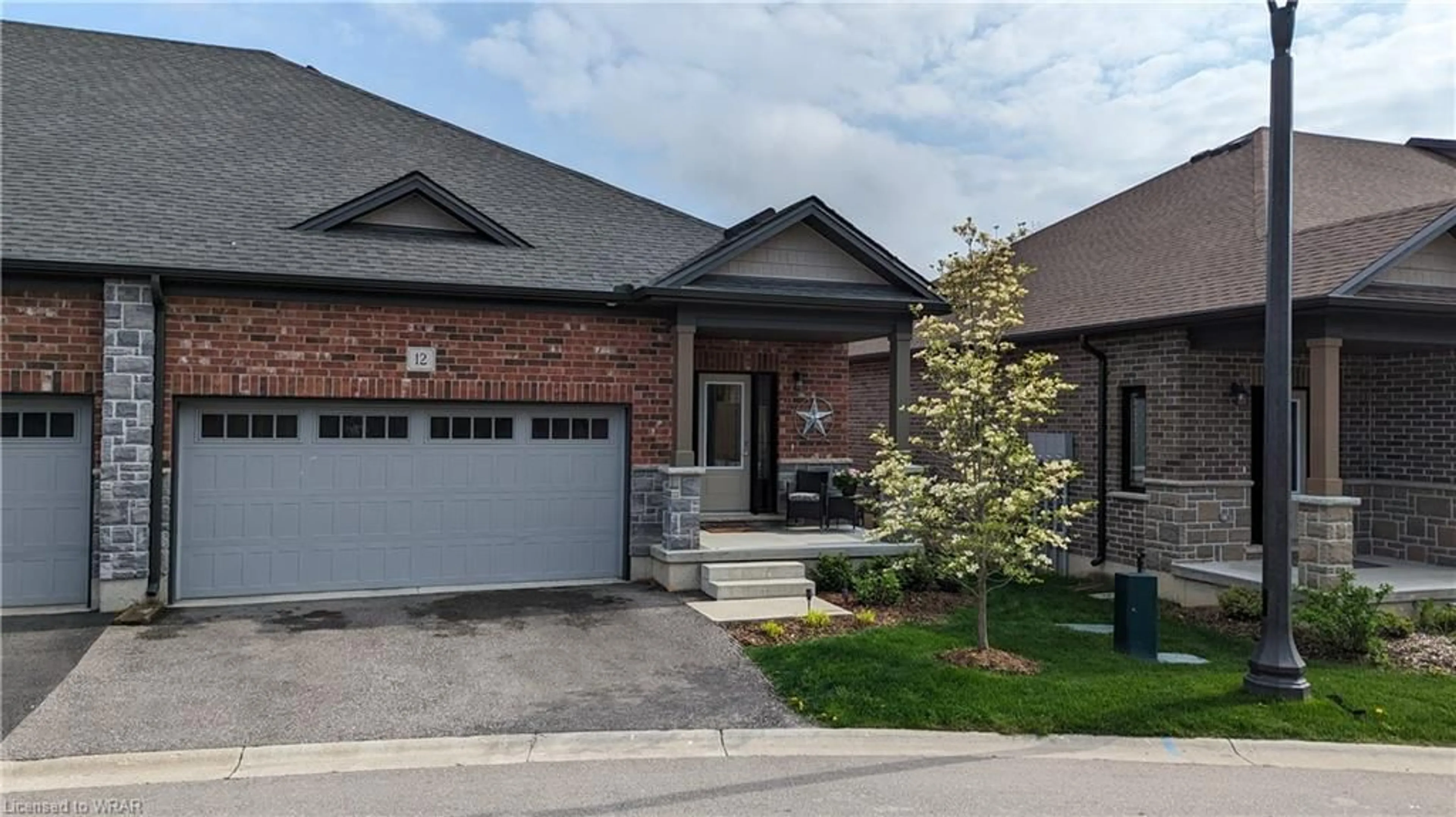 Home with brick exterior material for 12 Tamarack Way, Simcoe Ontario N3Y 0E5