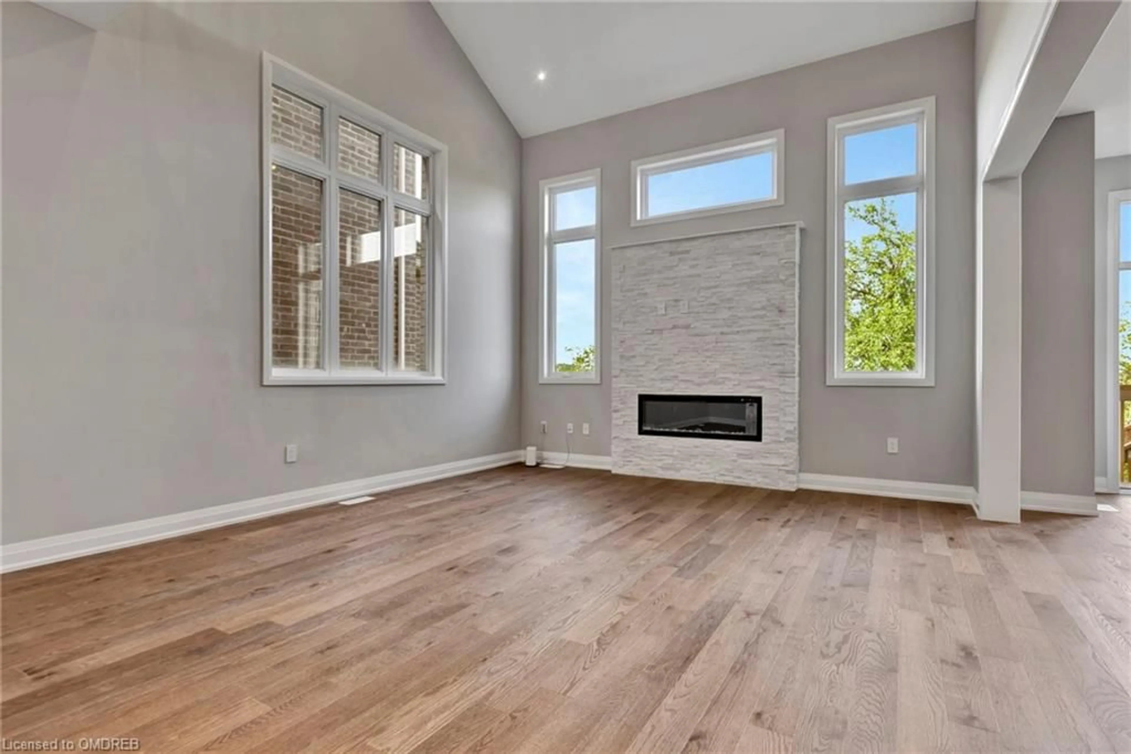 A pic of a room, wood floors for 3307 Harasym Trail, Oakville Ontario L6M 5N6