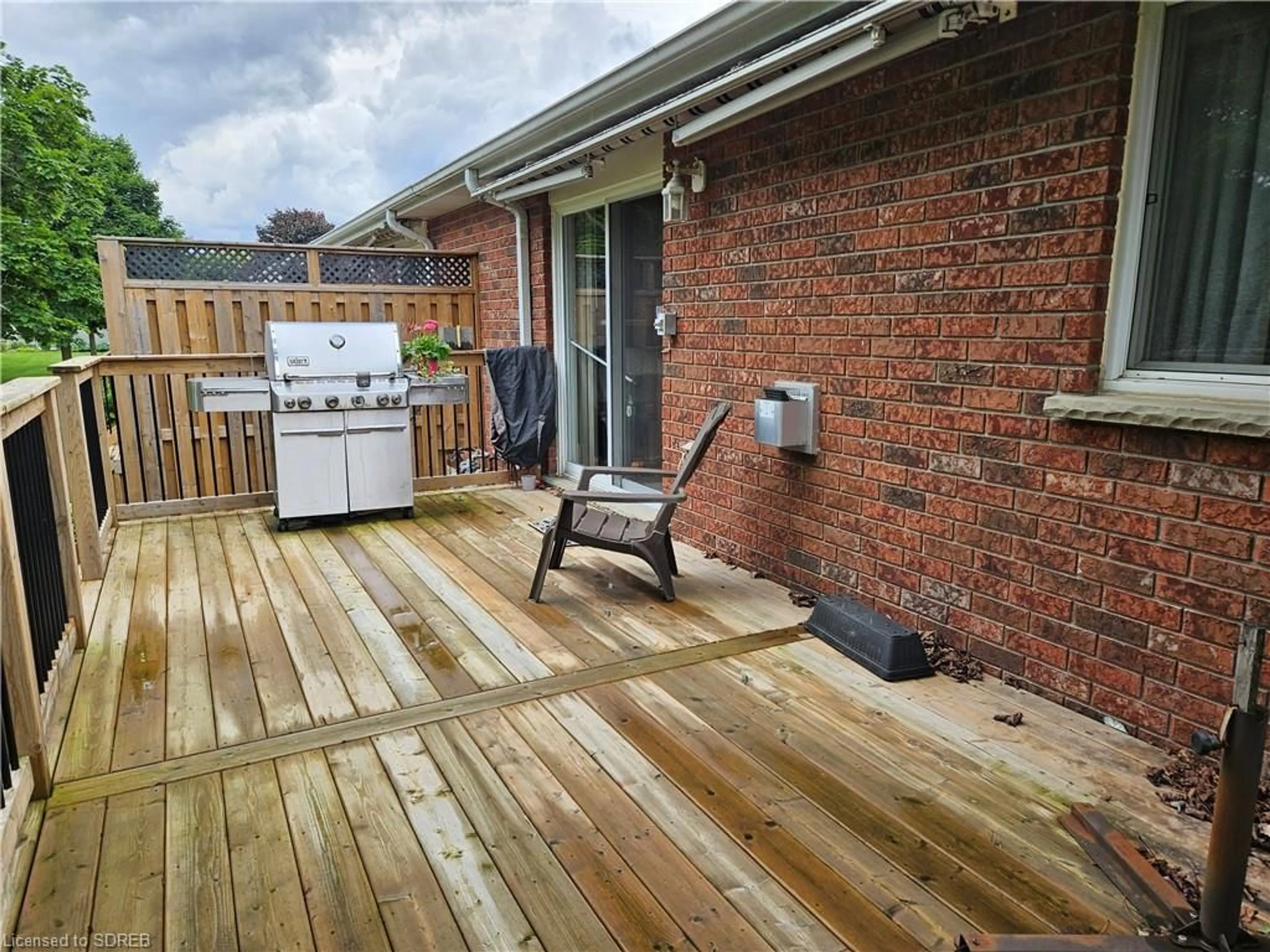 Patio, the fenced backyard for 74 Wilson Ave #7, Delhi Ontario N4B 3E7