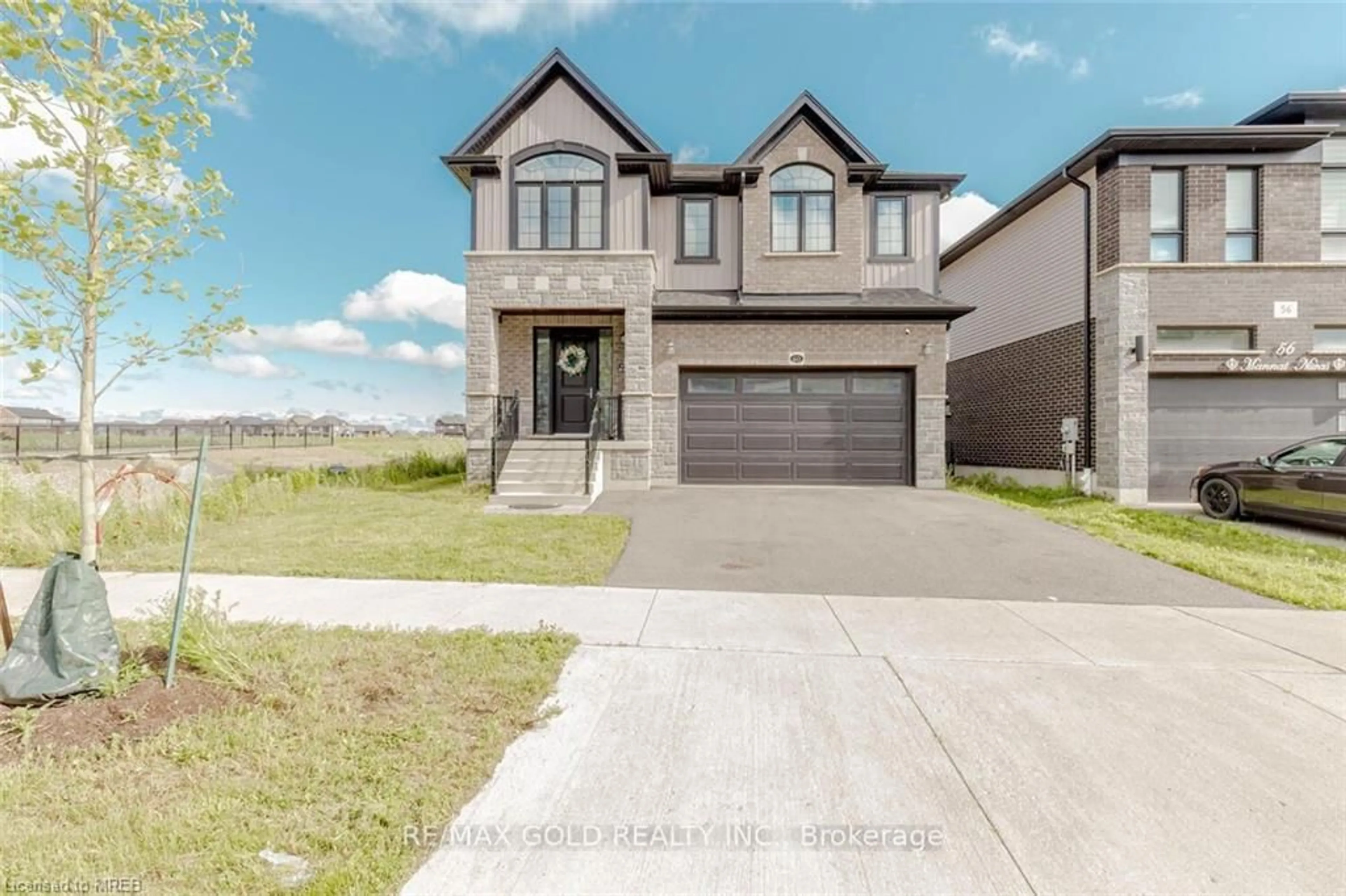 Frontside or backside of a home, the street view for 60 Monarch Woods Dr, Waterloo Ontario N2P 0K1