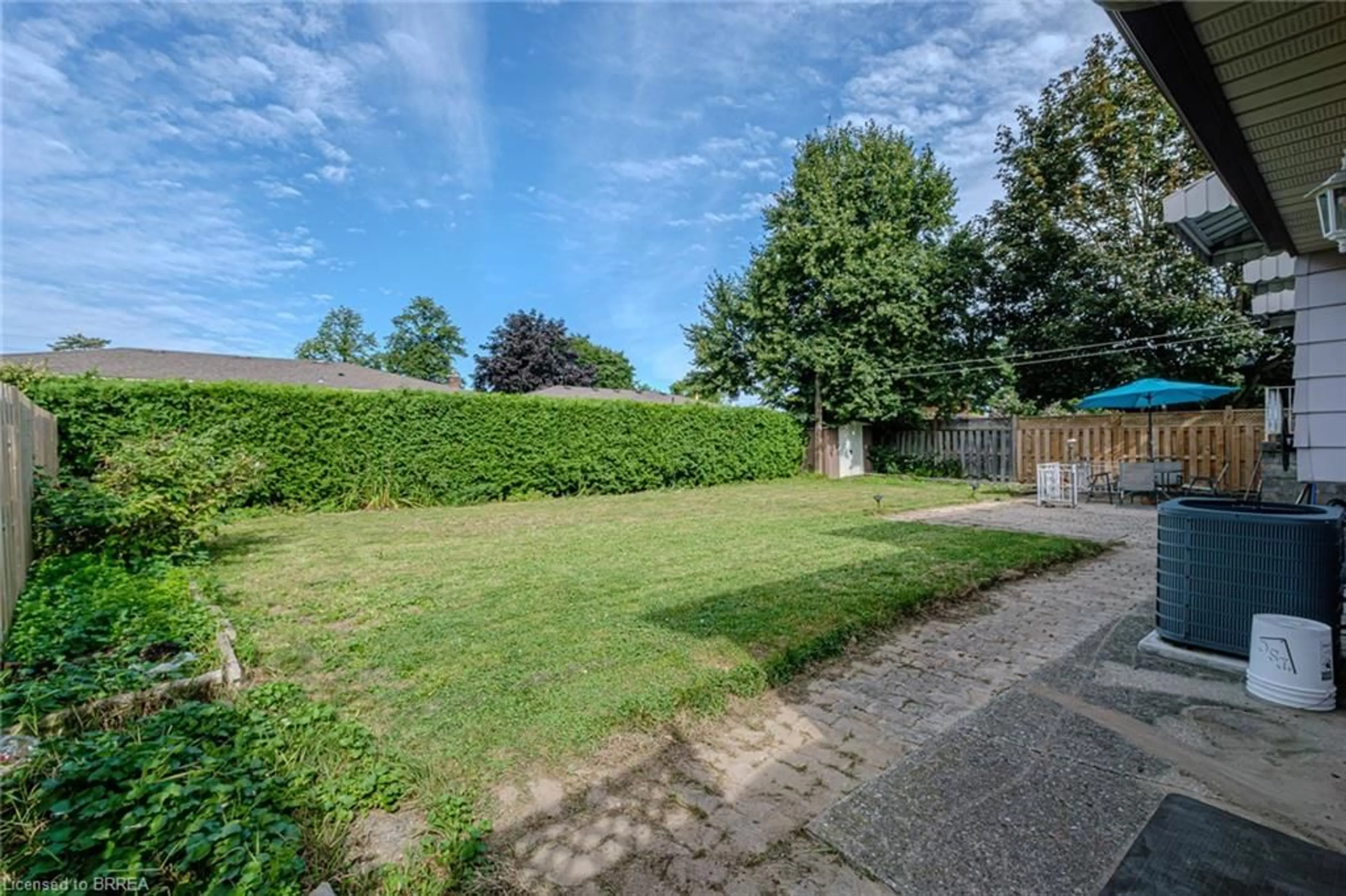 Patio, the fenced backyard for 14 Melbourne Cres, Brantford Ontario N3S 7G3