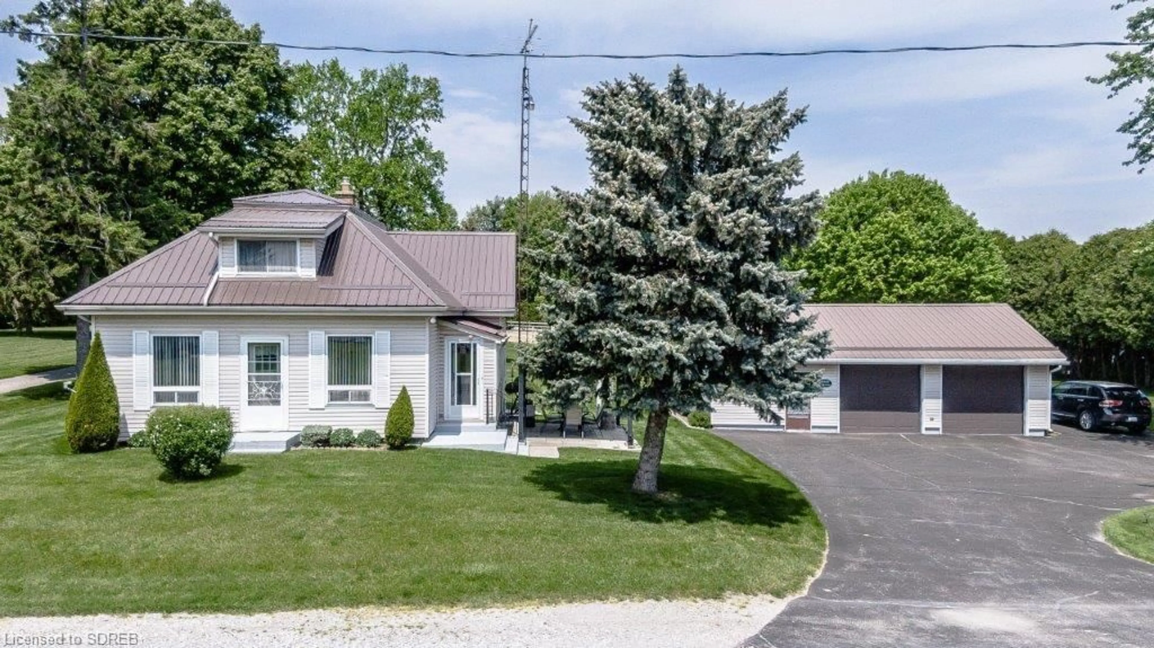 Frontside or backside of a home, the street view for 115 Mcdowell Rd, Simcoe Ontario N3Y 4J9