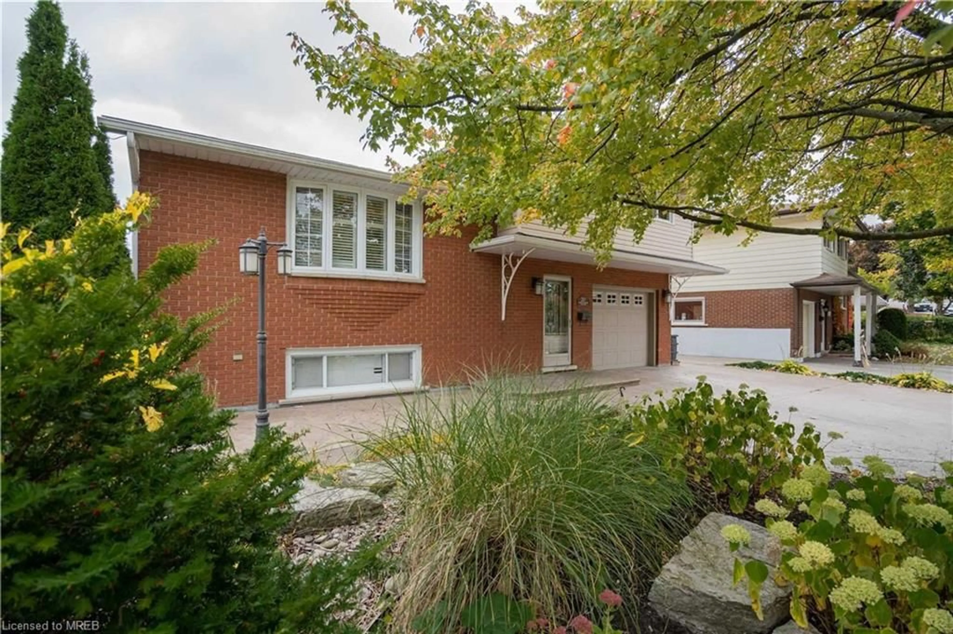 Home with brick exterior material for 207 Christopher Dr, Cambridge Ontario N1R 4S6