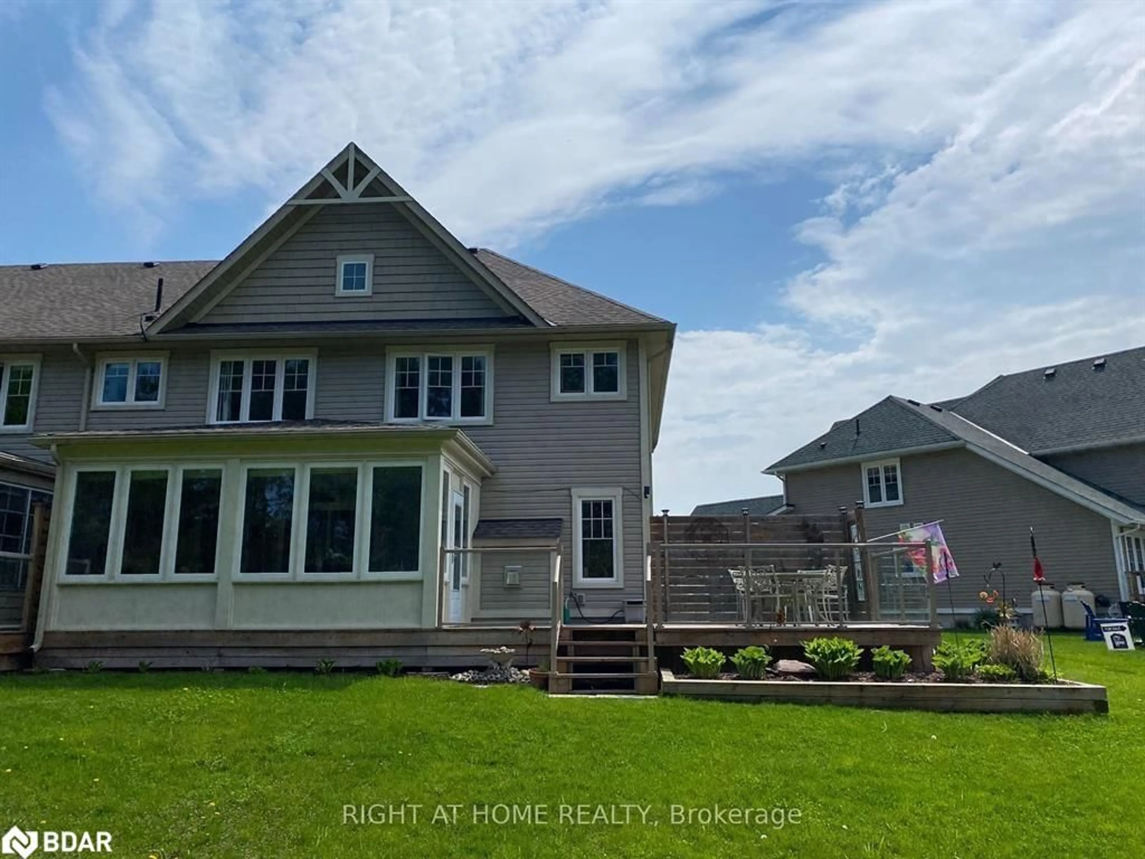 Frontside or backside of a home, the fenced backyard for 28 Masters Cres, Port Severn Ontario L0K 1S0