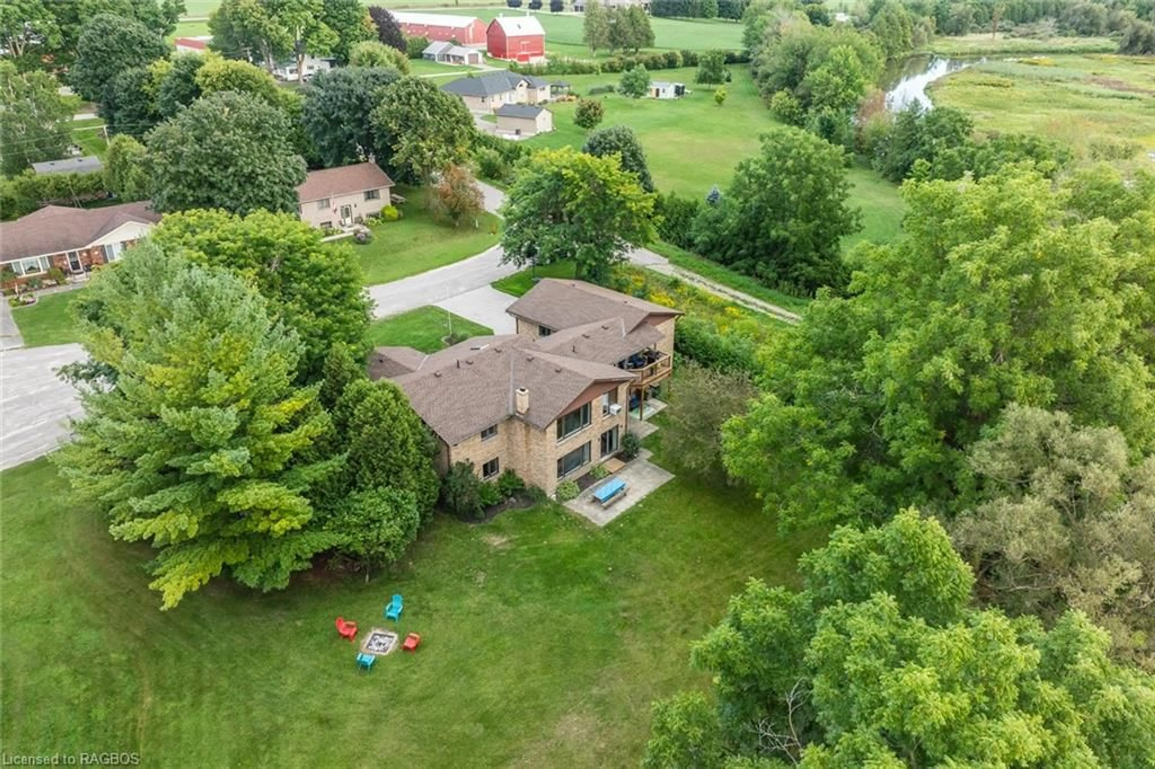 Frontside or backside of a home, the fenced backyard for 216 Fisher Cres, Ayton Ontario N0G 1C0