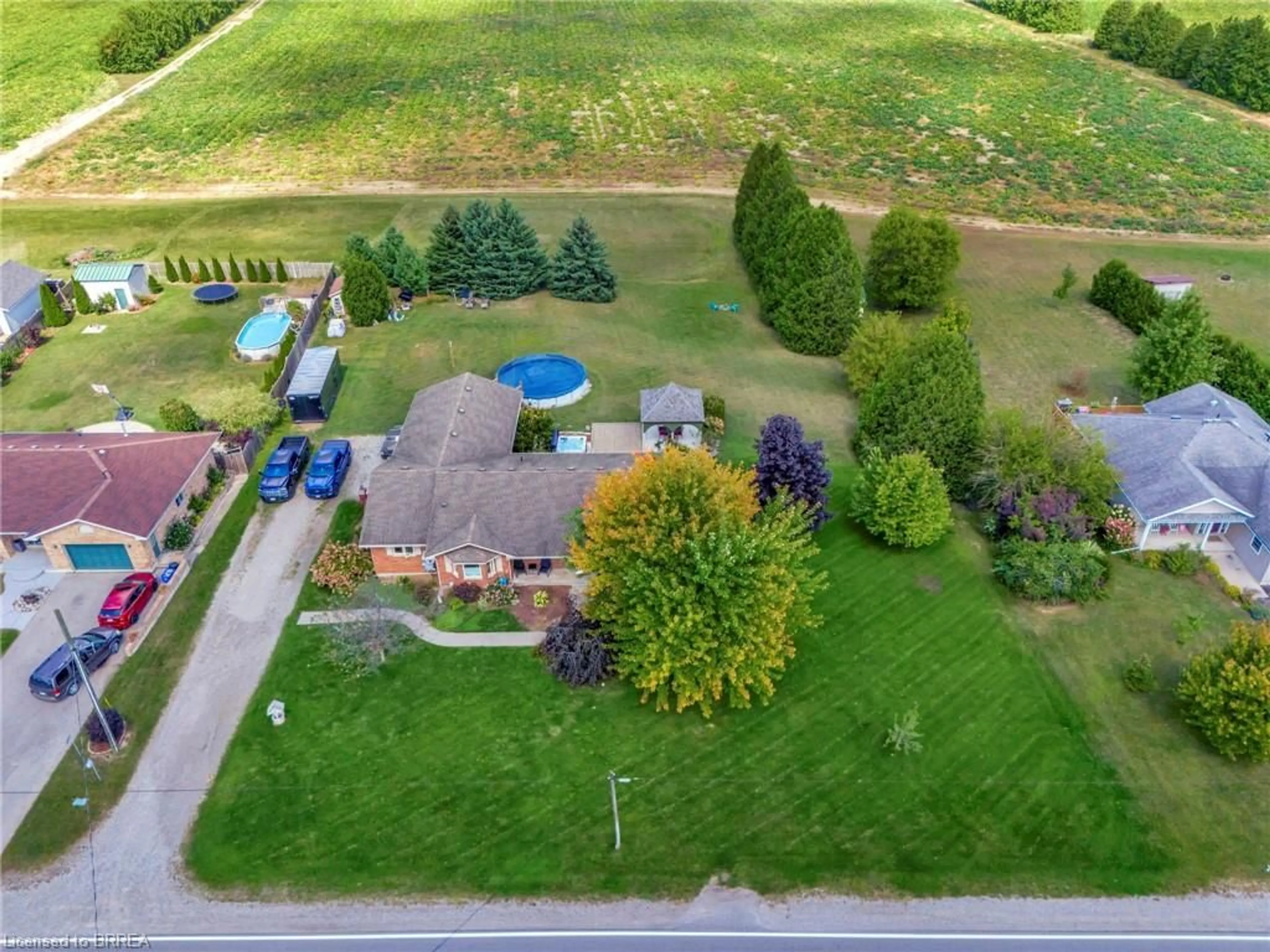 Frontside or backside of a home, the fenced backyard for 56508 Heritage Line, Straffordville Ontario N0J 1Y0