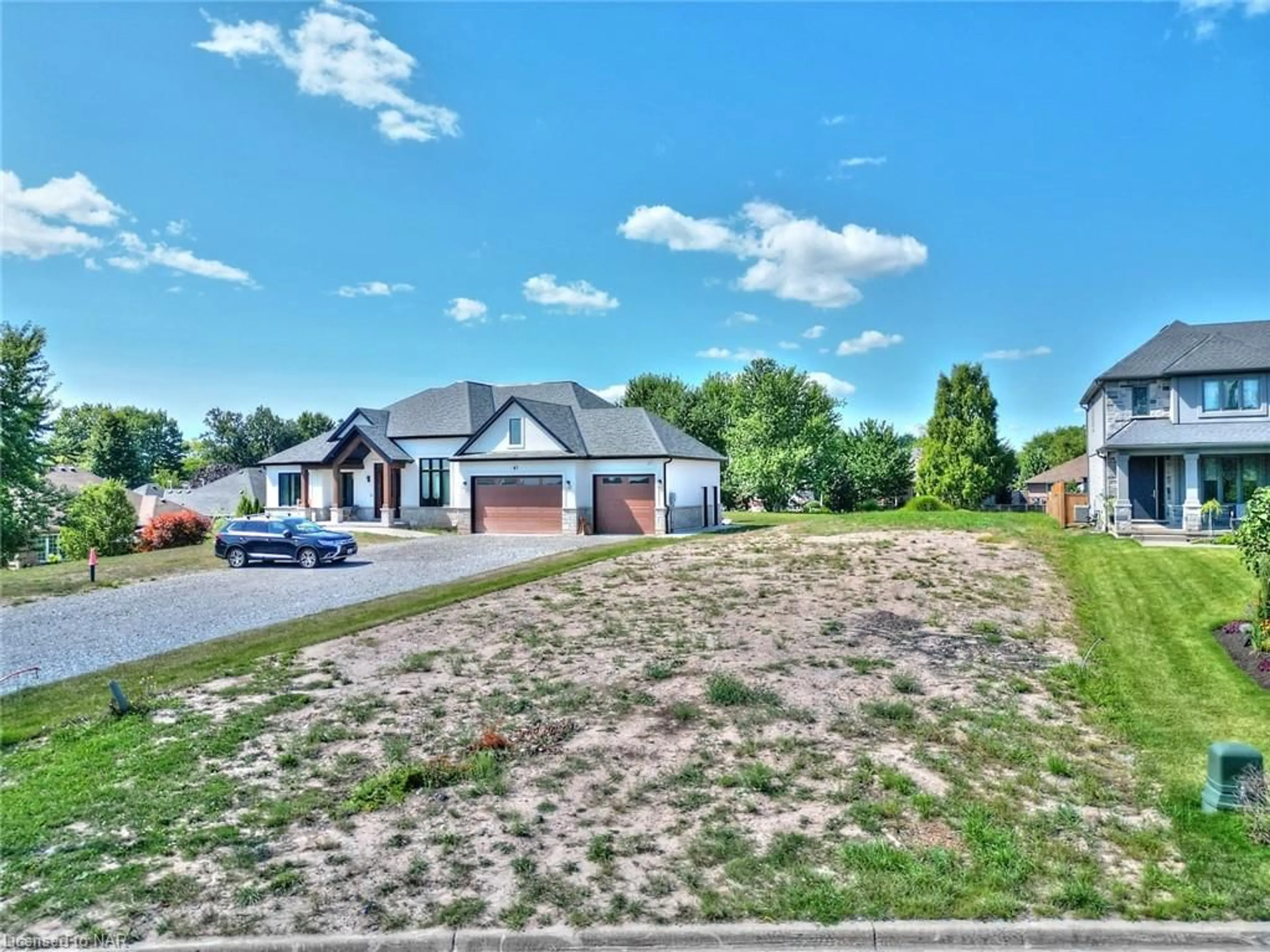 Frontside or backside of a home, the street view for 61 Adah Crt, Welland Ontario L3C 7A6