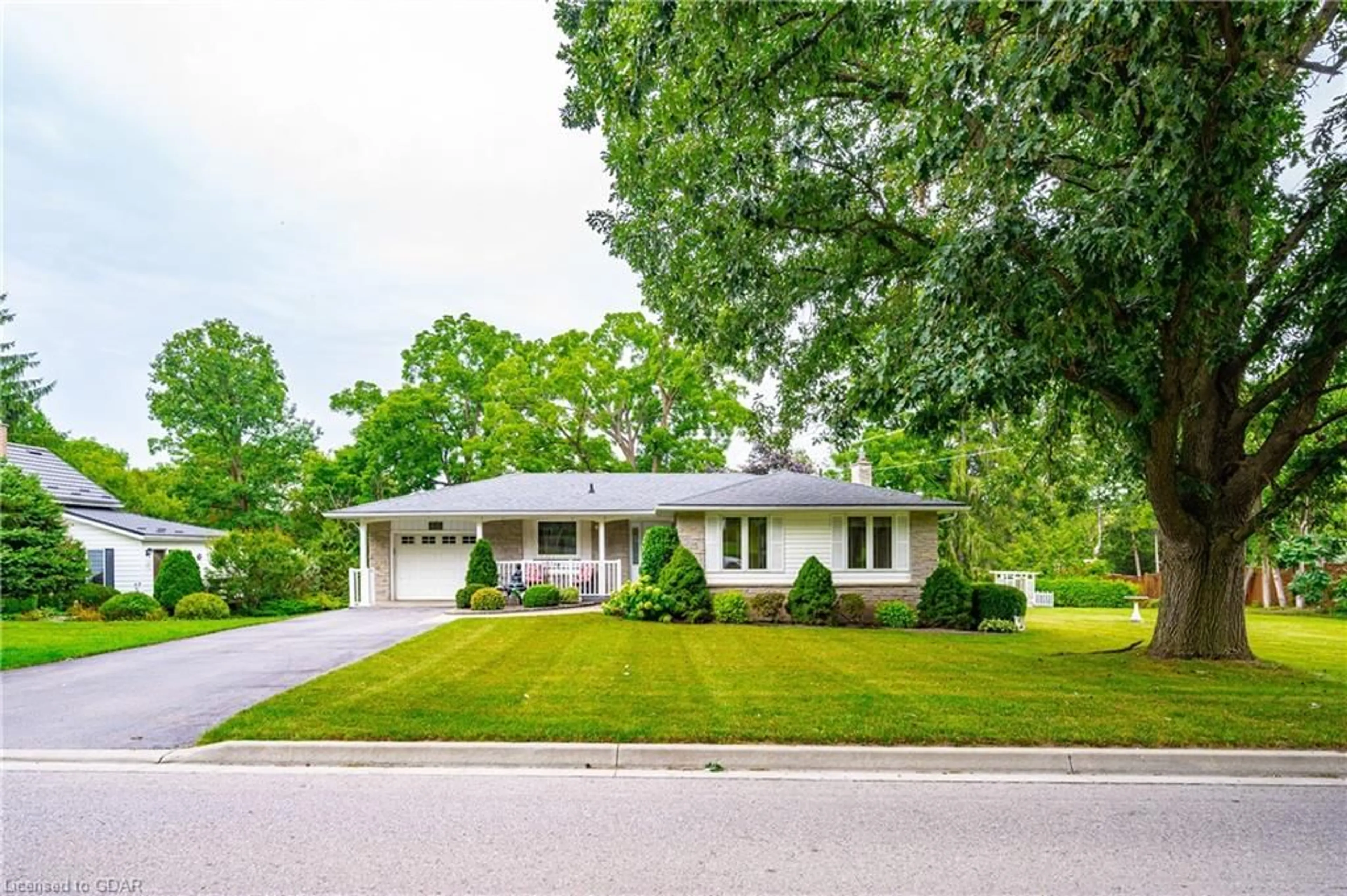 Frontside or backside of a home, the street view for 48 Water St, Elora Ontario N0B 1S0