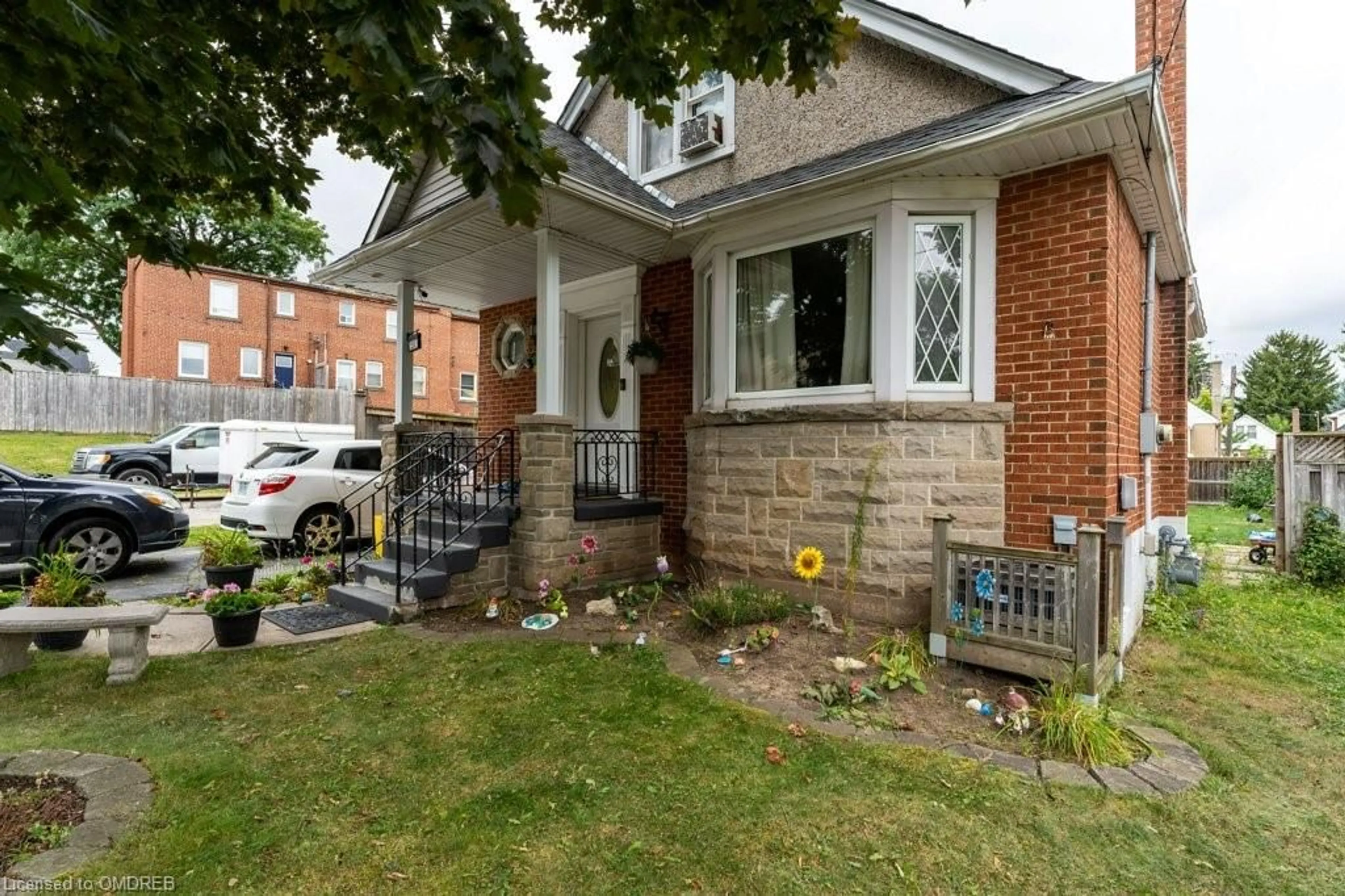 A pic from exterior of the house or condo, the fenced backyard for 252 Glencairn Ave, Hamilton Ontario L8K 3P2