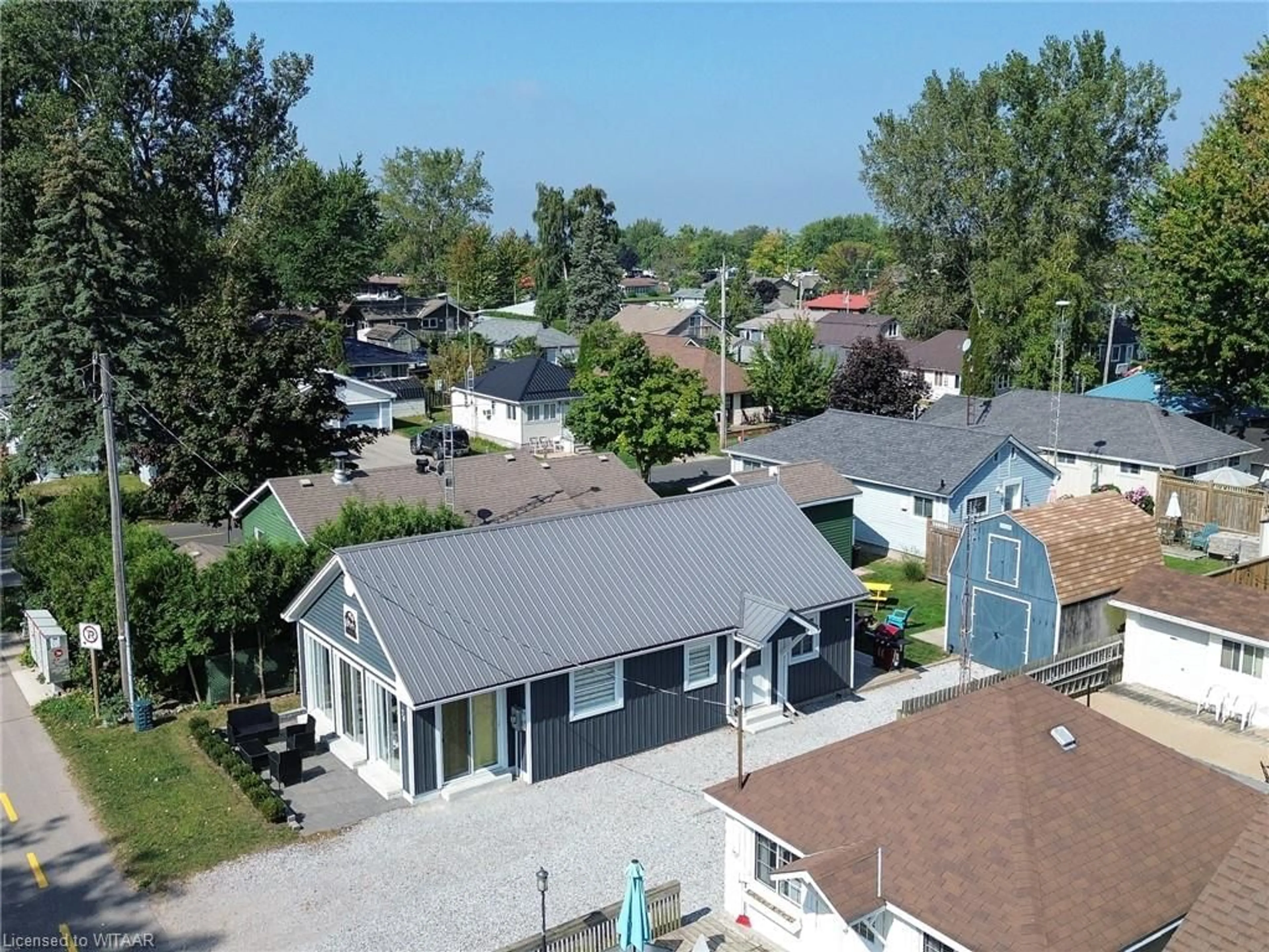 Frontside or backside of a home, cottage for 74 Erie Blvd, Long Point Ontario N0E 1M0