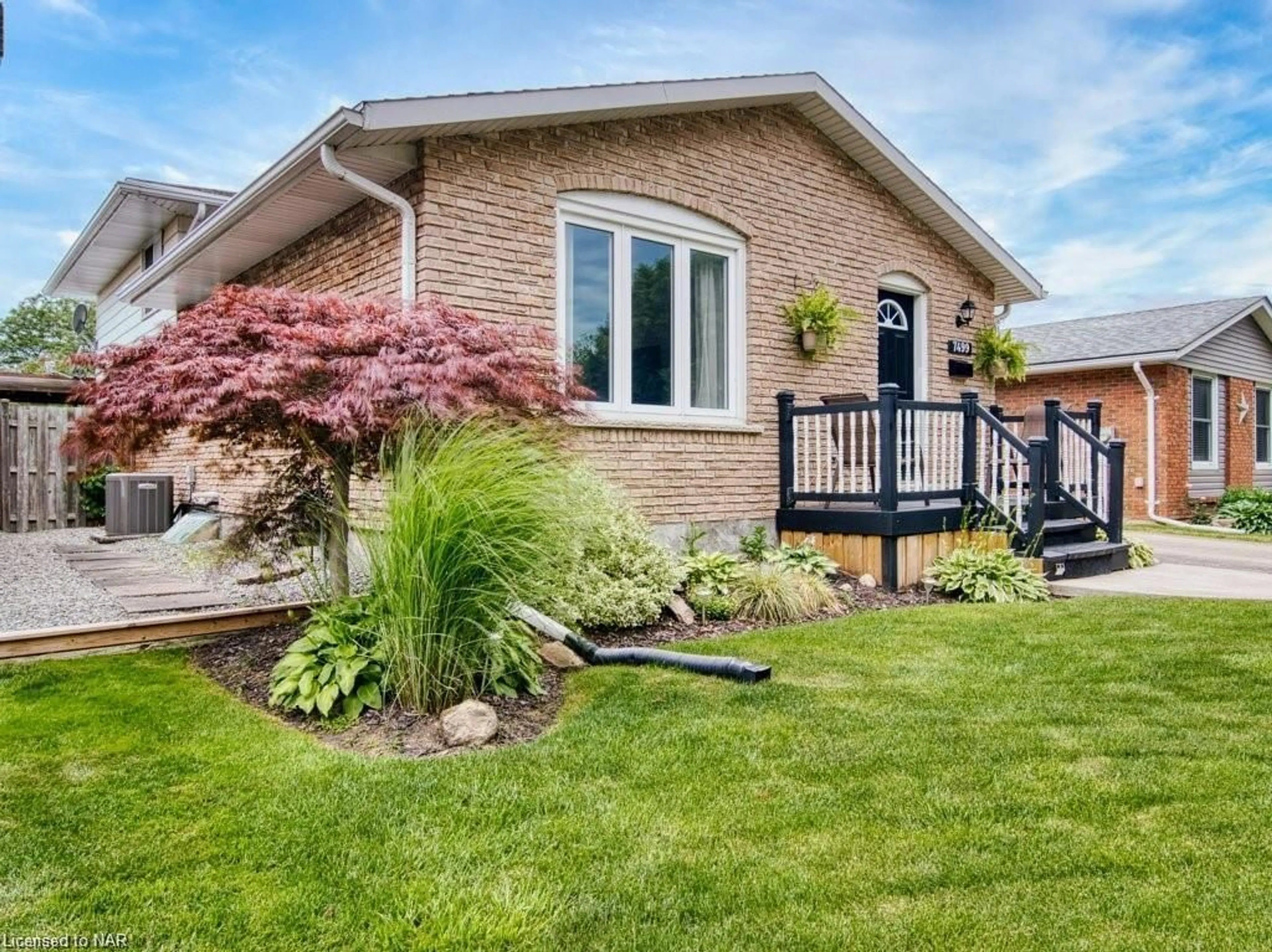 Frontside or backside of a home, the fenced backyard for 7499 Jubilee Dr, Niagara Falls Ontario L2G 7J2