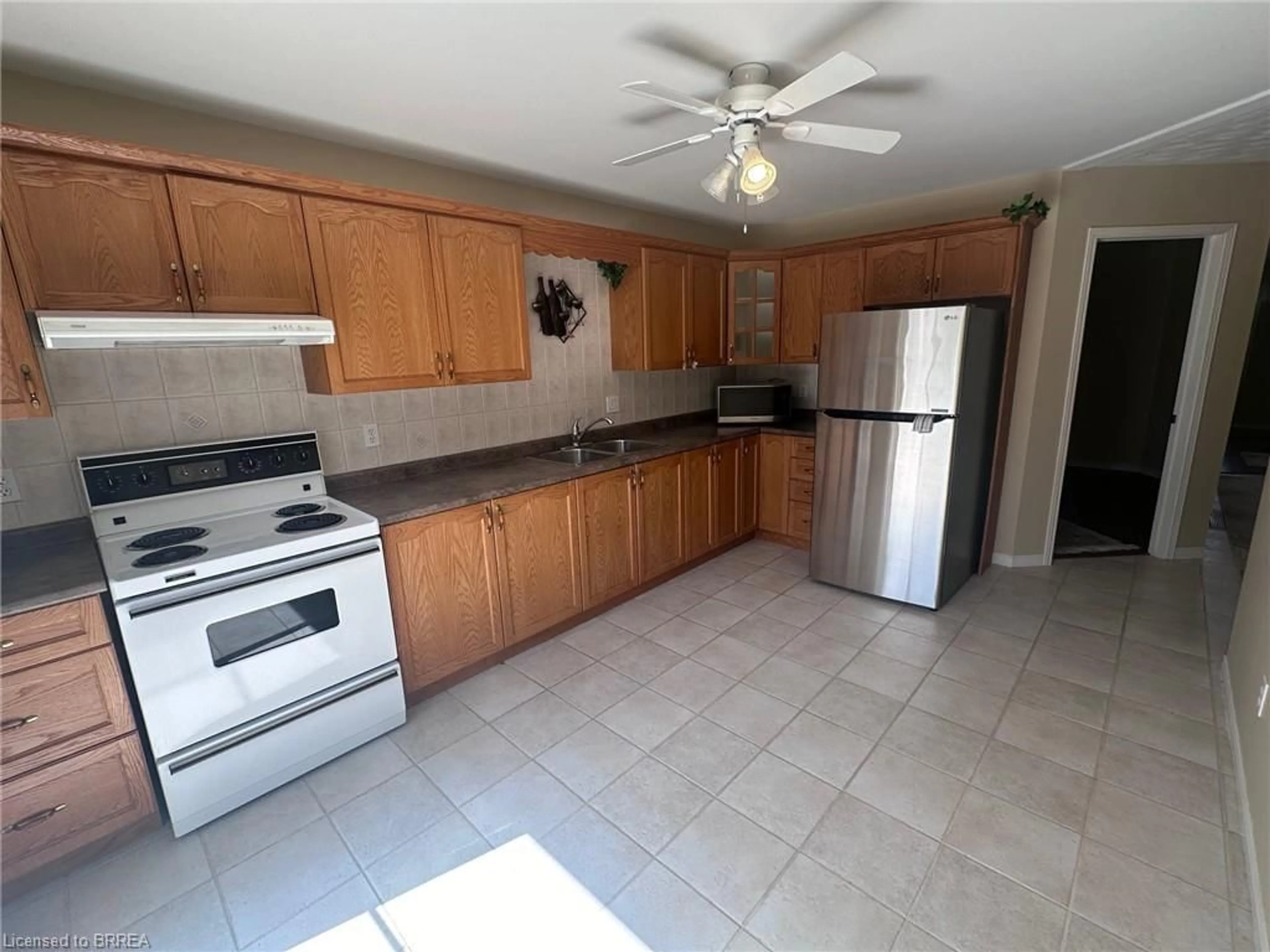 Standard kitchen, cement floor, cottage for 201 Grand St, Brantford Ontario N3R 4C2