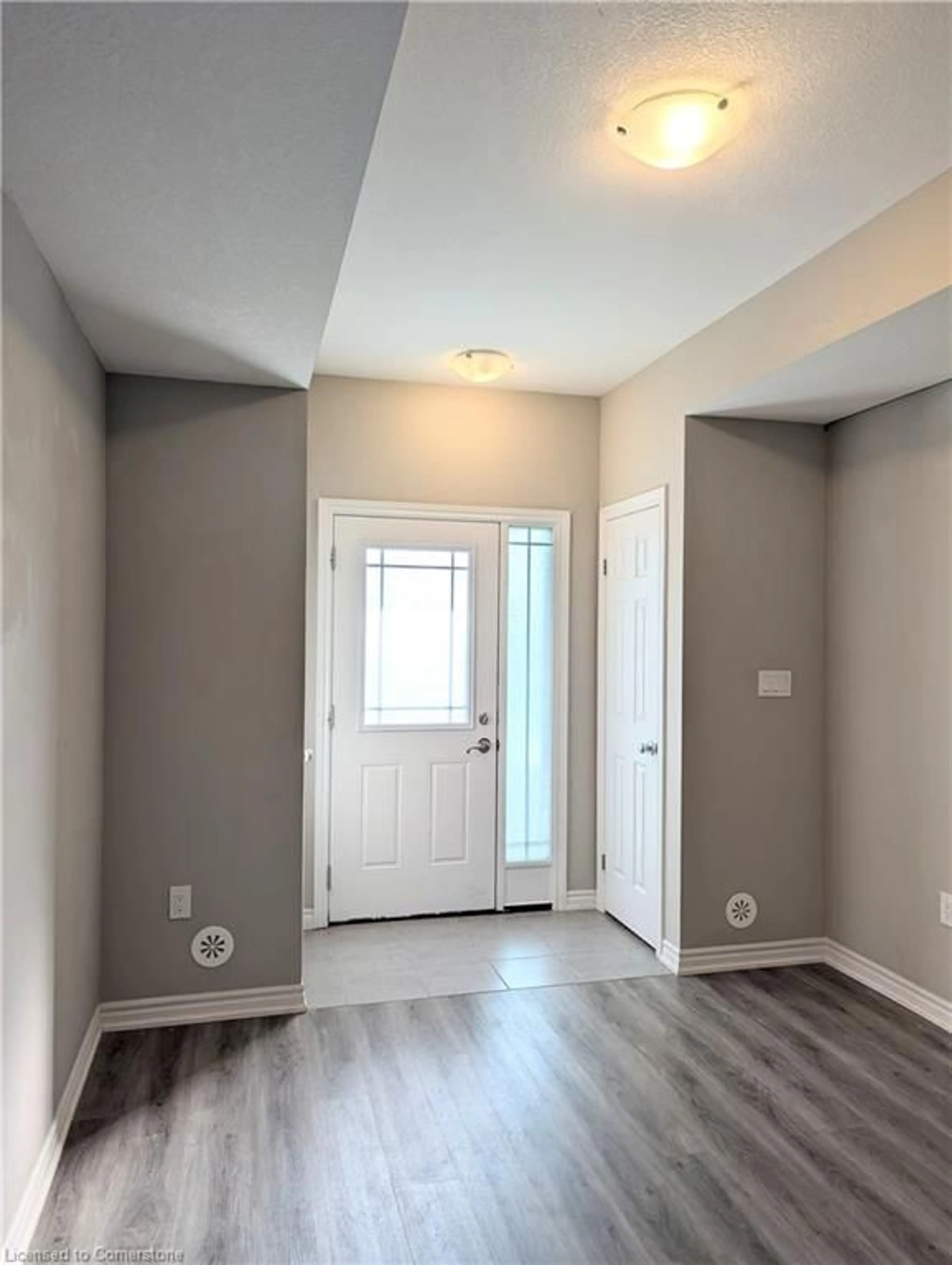 Indoor entryway, wood floors for 107 Westra Dr #70, Guelph Ontario N1K 0A5