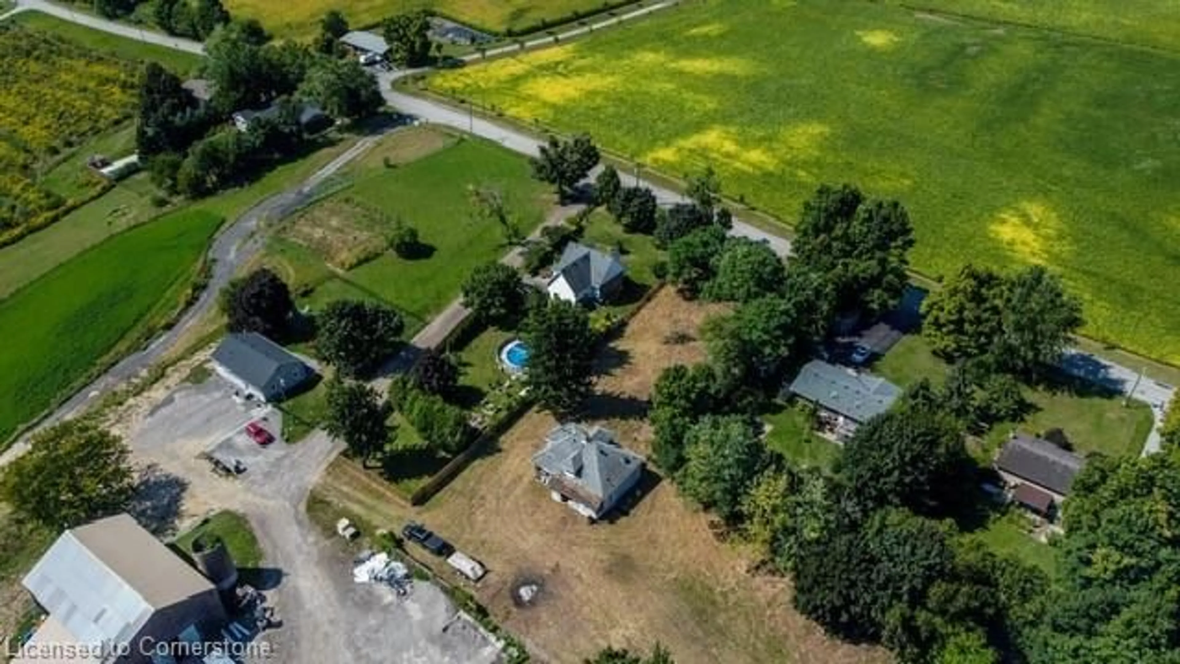 Frontside or backside of a home, the fenced backyard for 122 8th Con Rd, Flamborough Ontario L0A 1K0