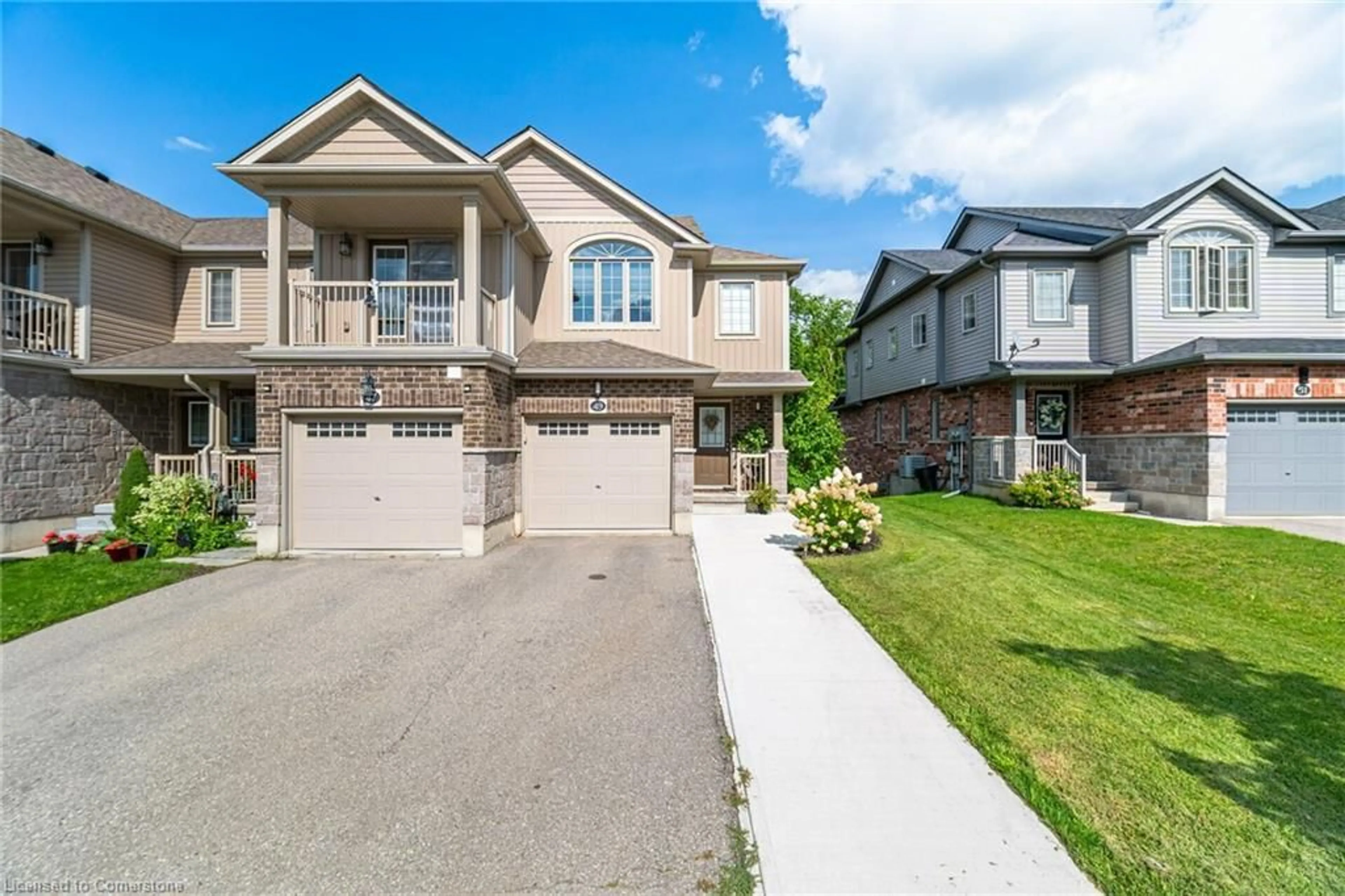 Frontside or backside of a home for 49 Meadowridge St, Kitchener Ontario N2P 0E2