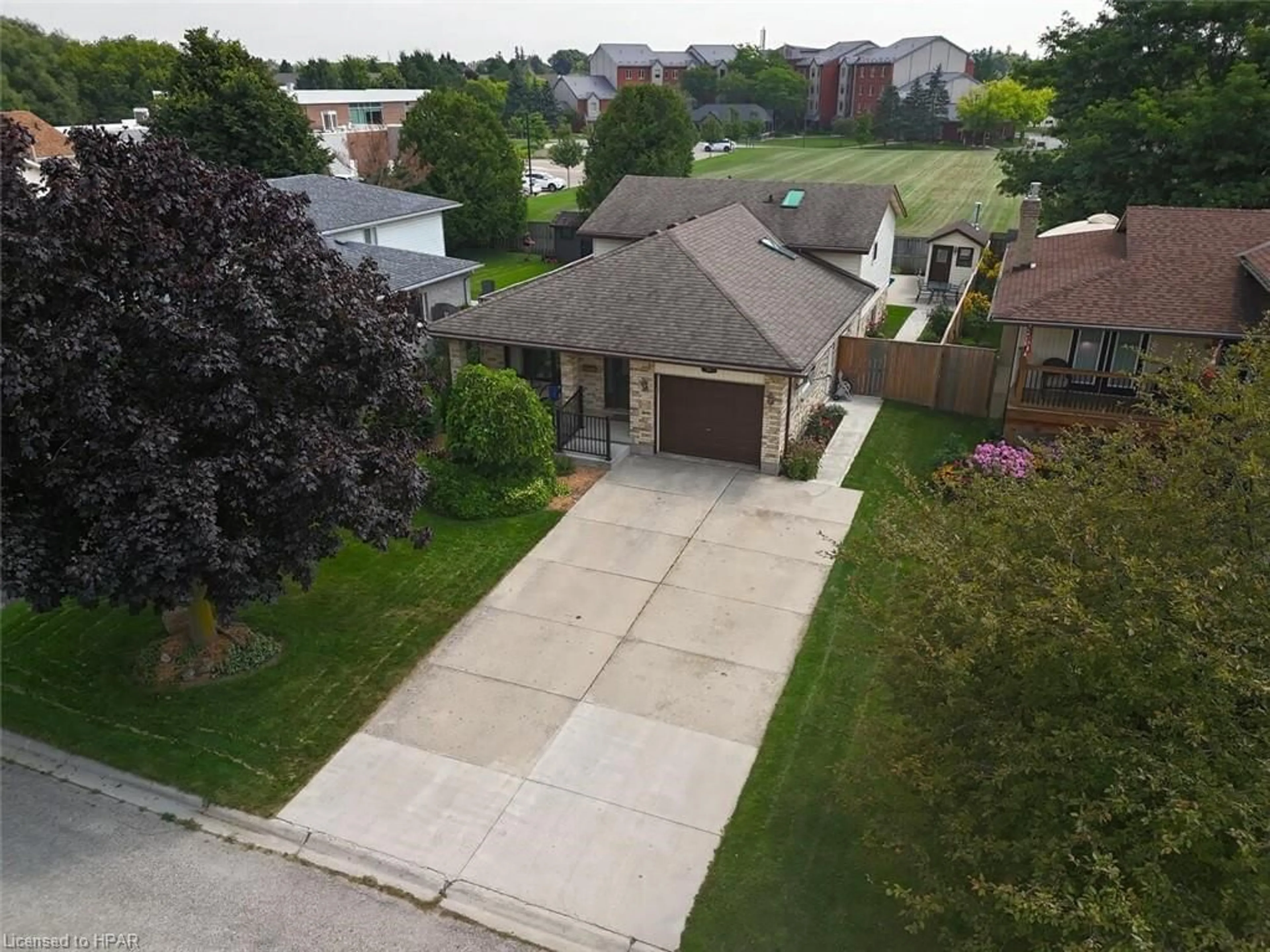 Frontside or backside of a home, the fenced backyard for 91 Norwood Crt, Stratford Ontario N5A 7R8