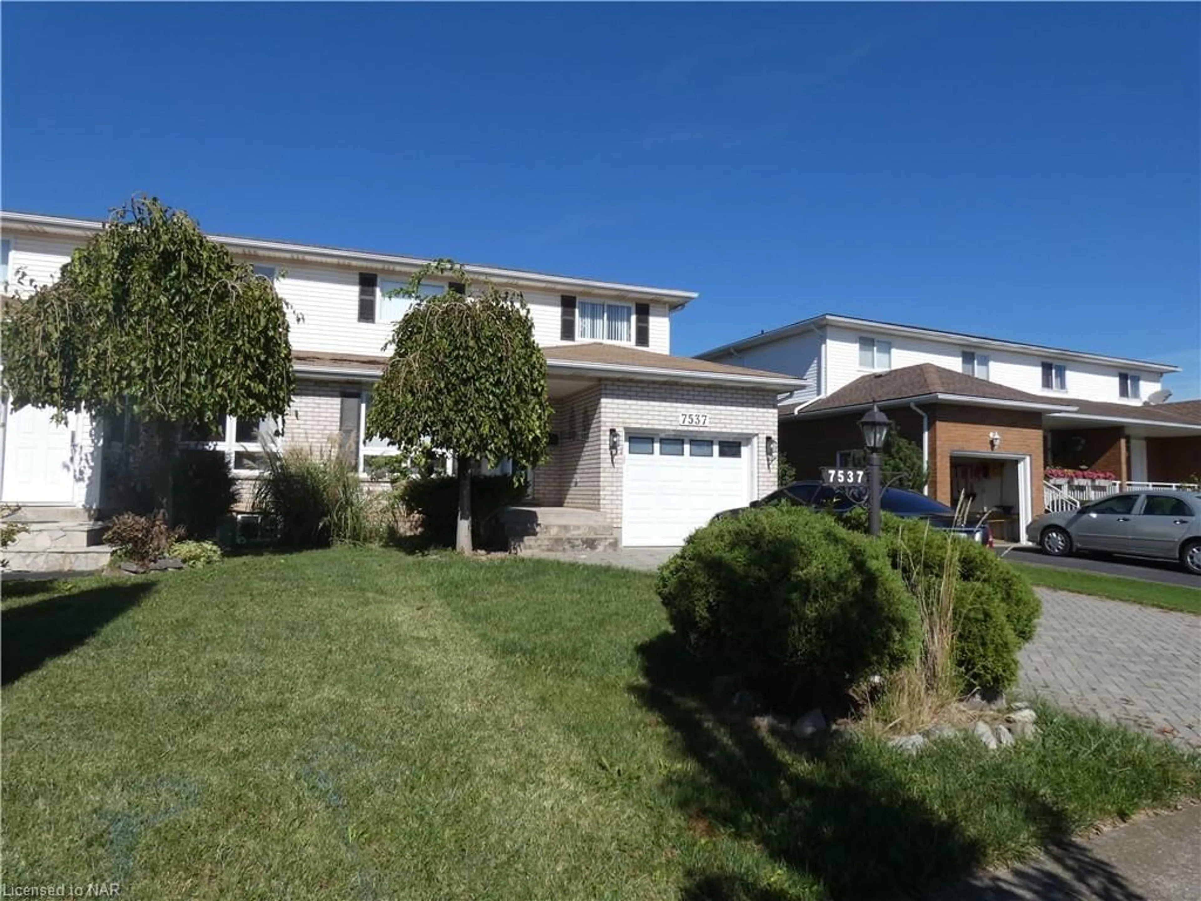 Frontside or backside of a home, the street view for 7537 Monastery Dr, Niagara Falls Ontario L2H 3A7