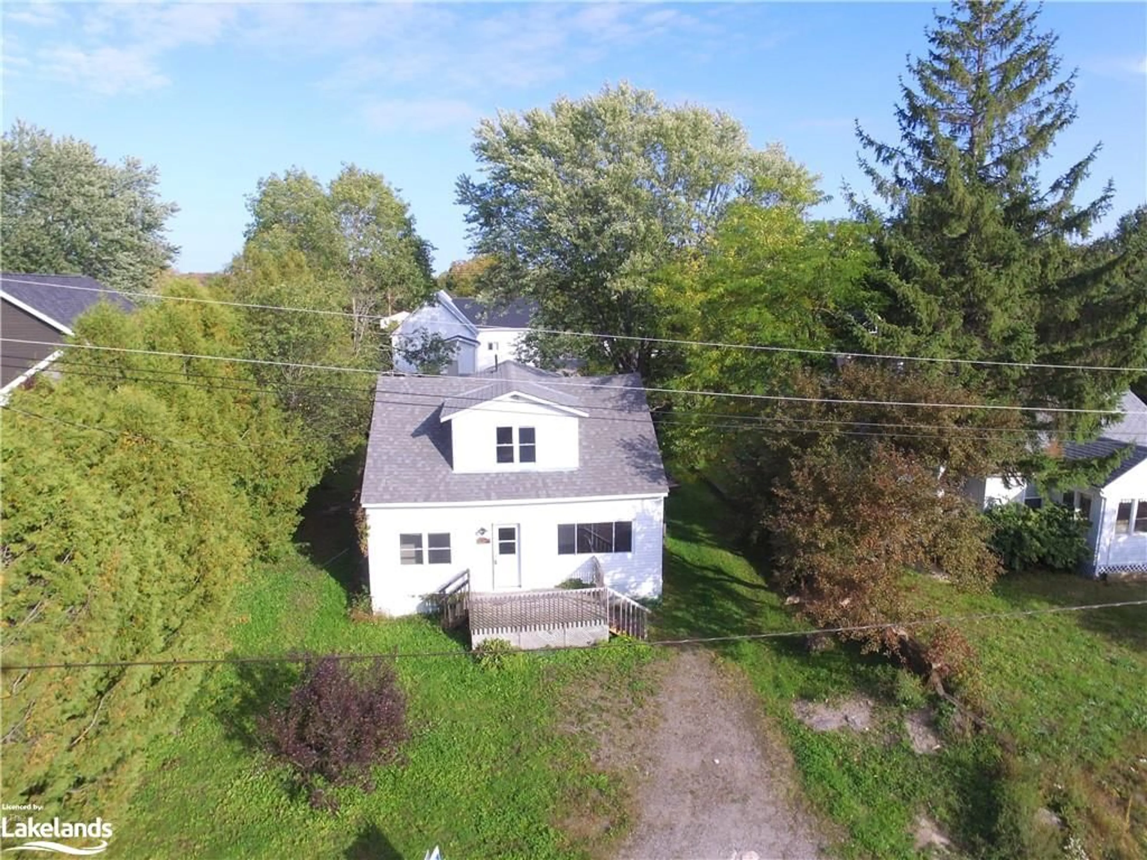 Frontside or backside of a home, cottage for 14 Joseph St, MacTier Ontario P0C 1H0