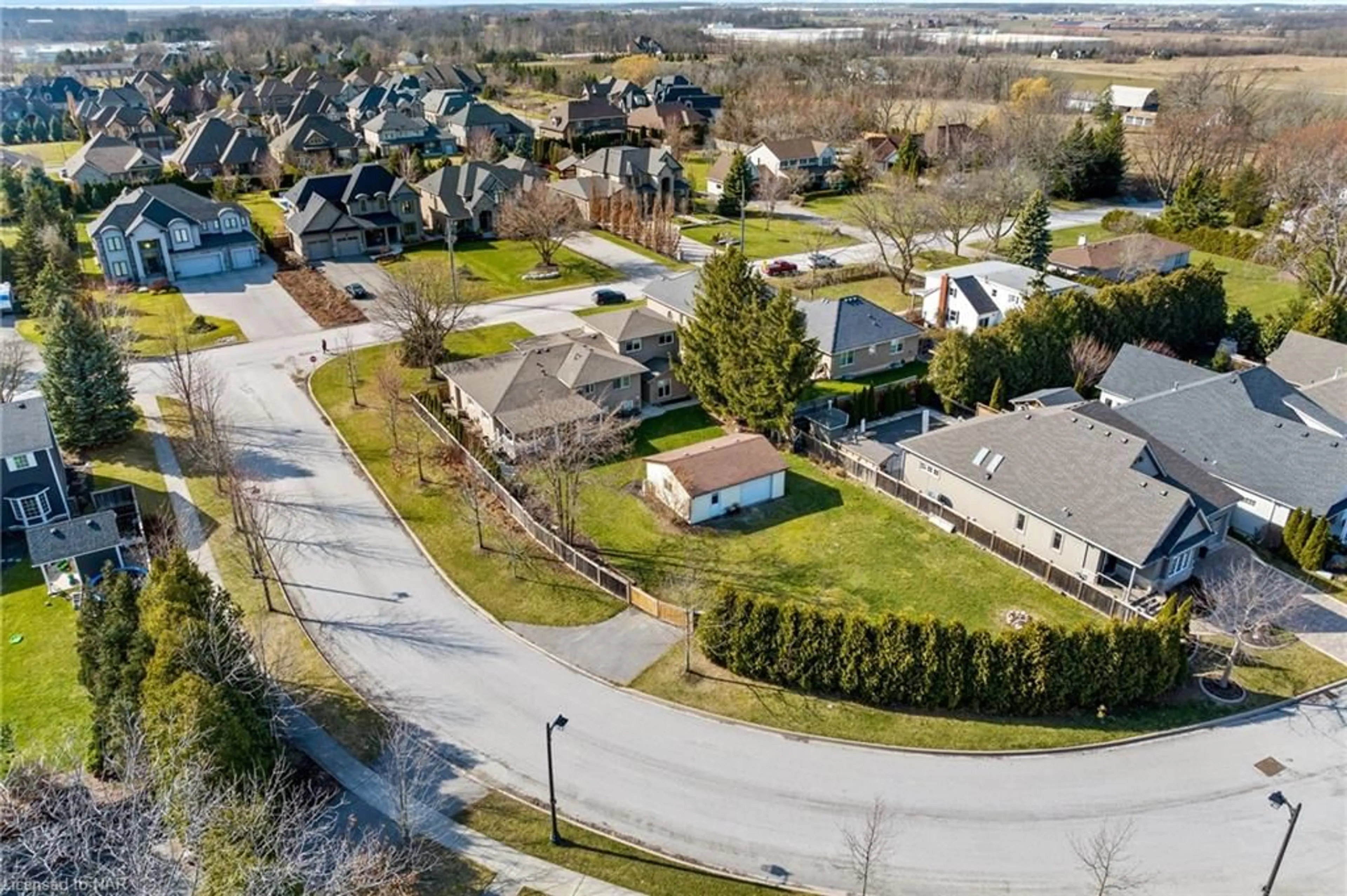 Frontside or backside of a home, the fenced backyard for 287 Tanbark Rd, Niagara-on-the-Lake Ontario L0S 1P0