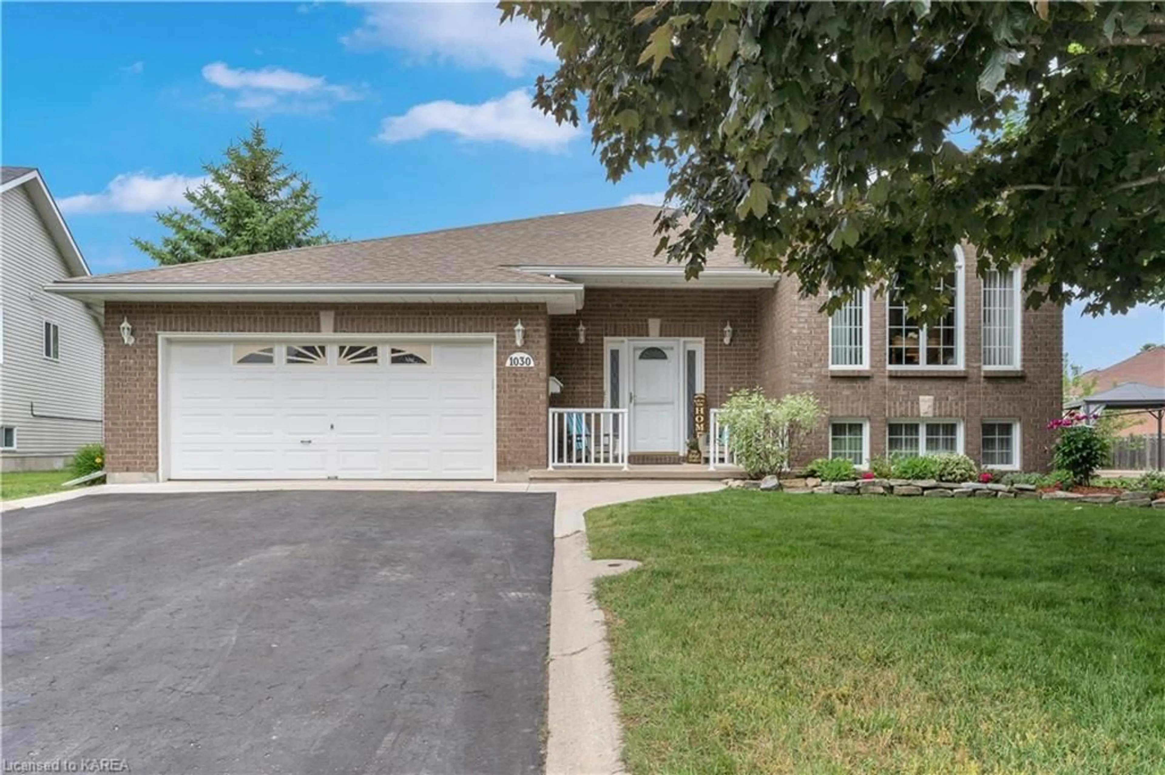 Frontside or backside of a home, the street view for 1030 Greenwood Park Dr, Kingston Ontario K7K 7C7