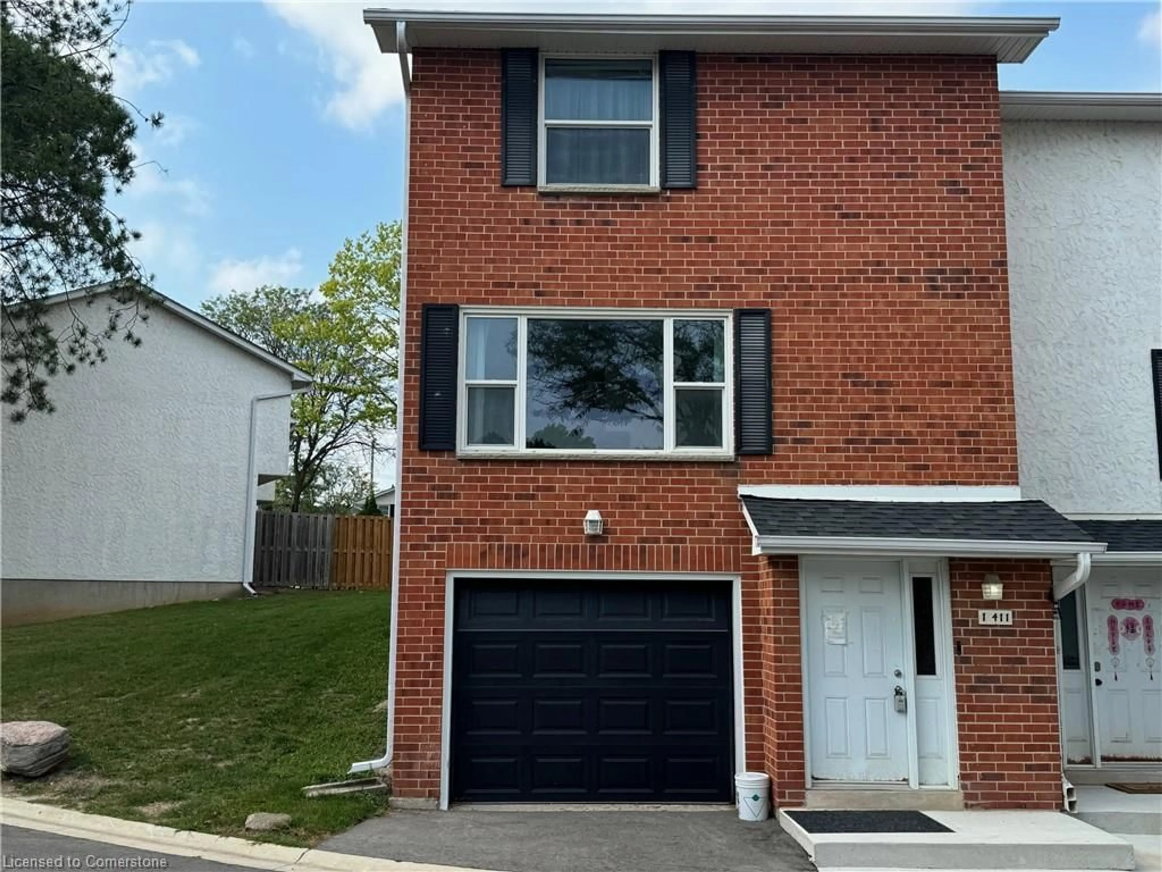 A pic from exterior of the house or condo for 411 Keats Way #1, Waterloo Ontario N2L 5S7