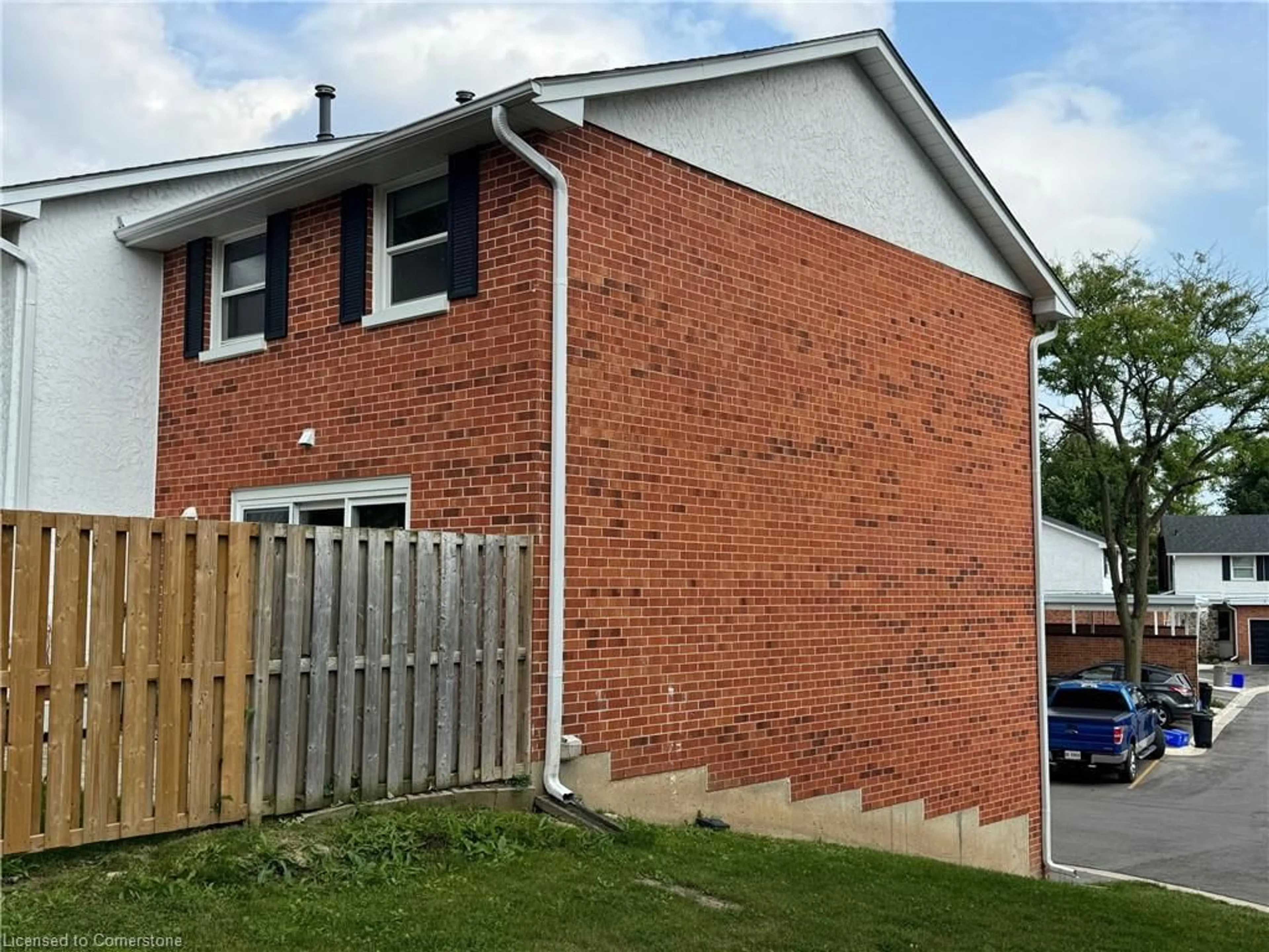 Home with brick exterior material for 411 Keats Way #1, Waterloo Ontario N2L 5S7