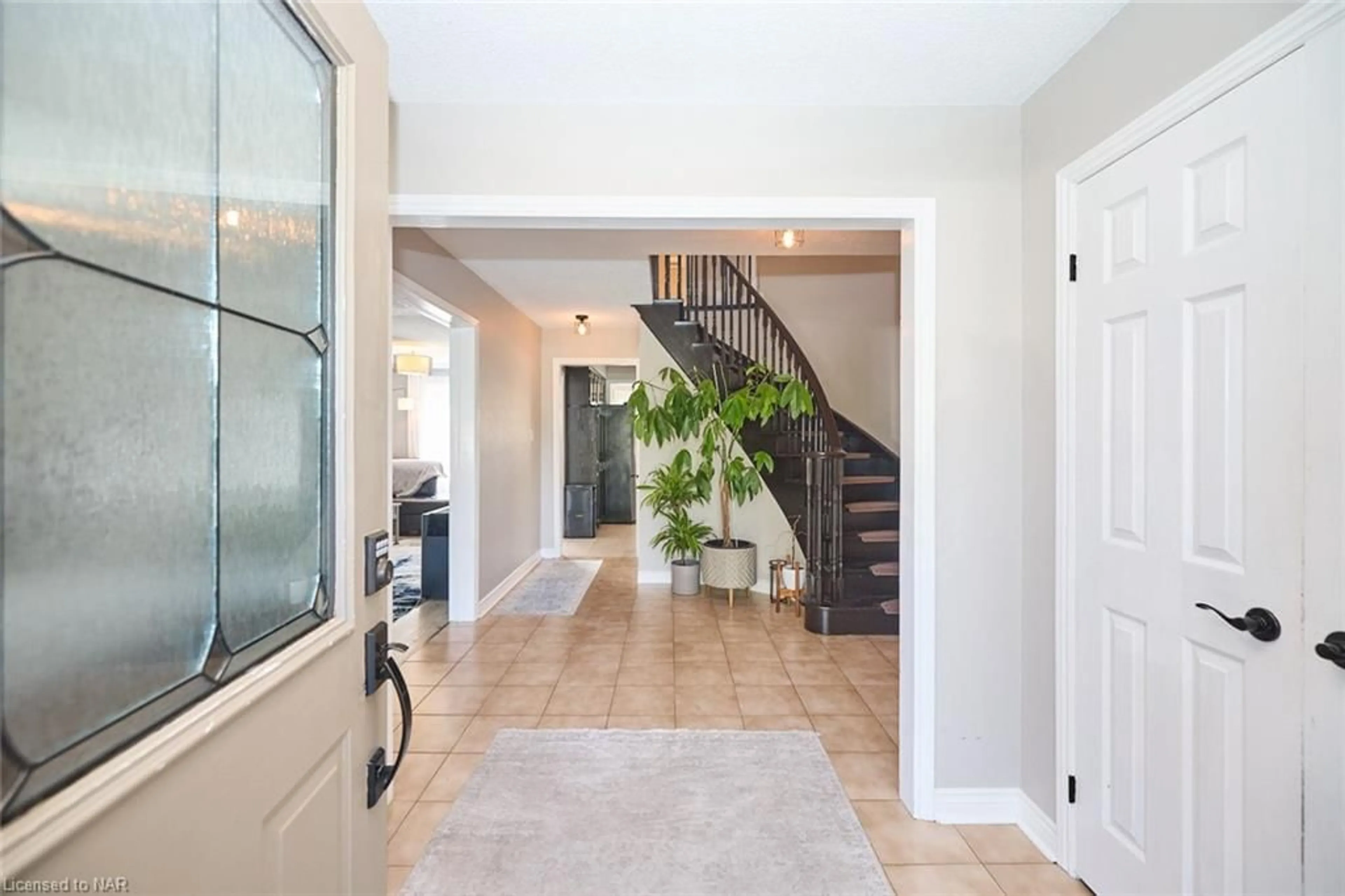 Indoor entryway, wood floors for 23 Barbican Trail, St. Catharines Ontario L2T 4A2