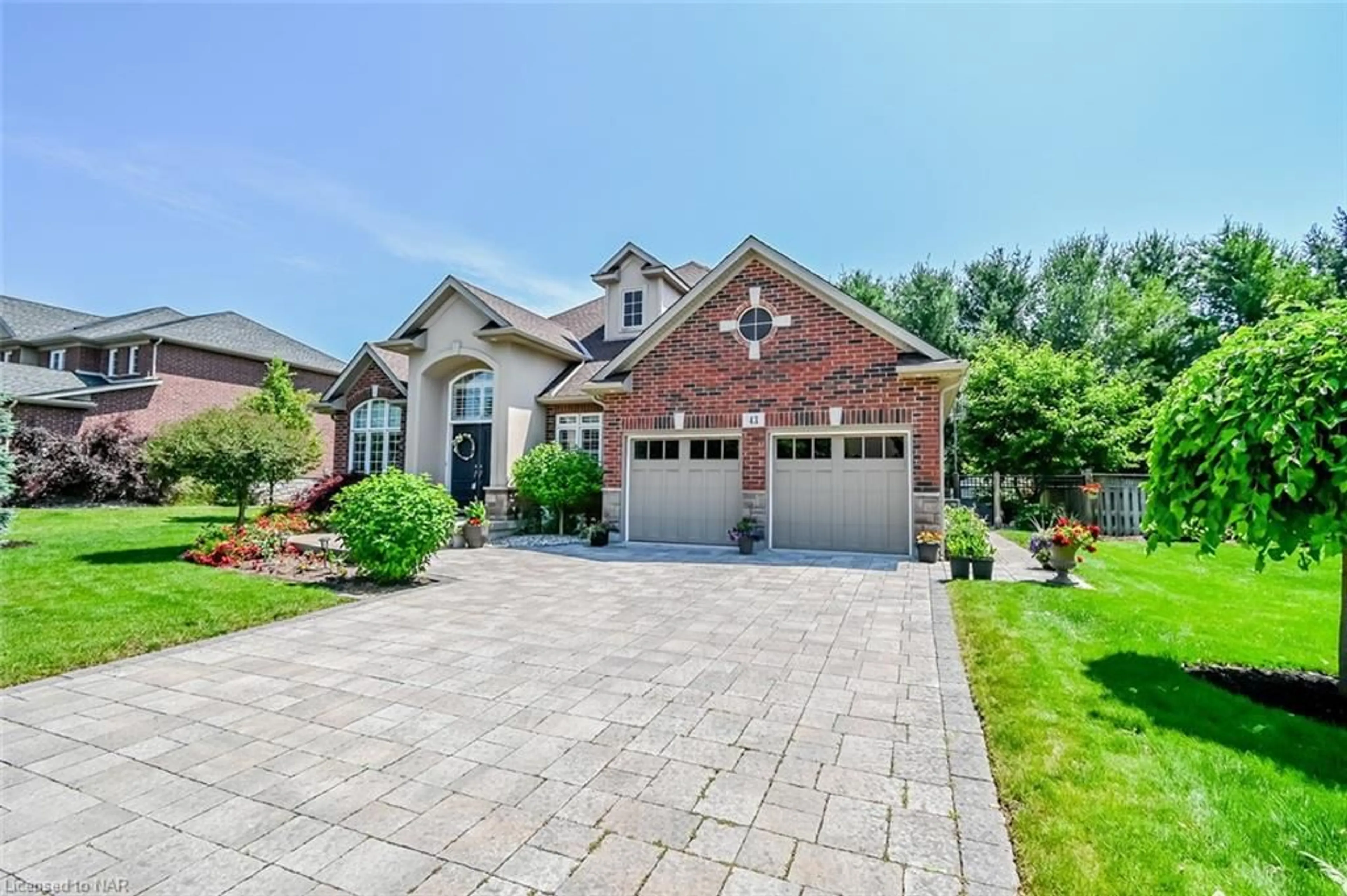 Home with brick exterior material for 43 Cherry Ridge Boulevard Blvd, Fenwick Ontario L0S 1C0