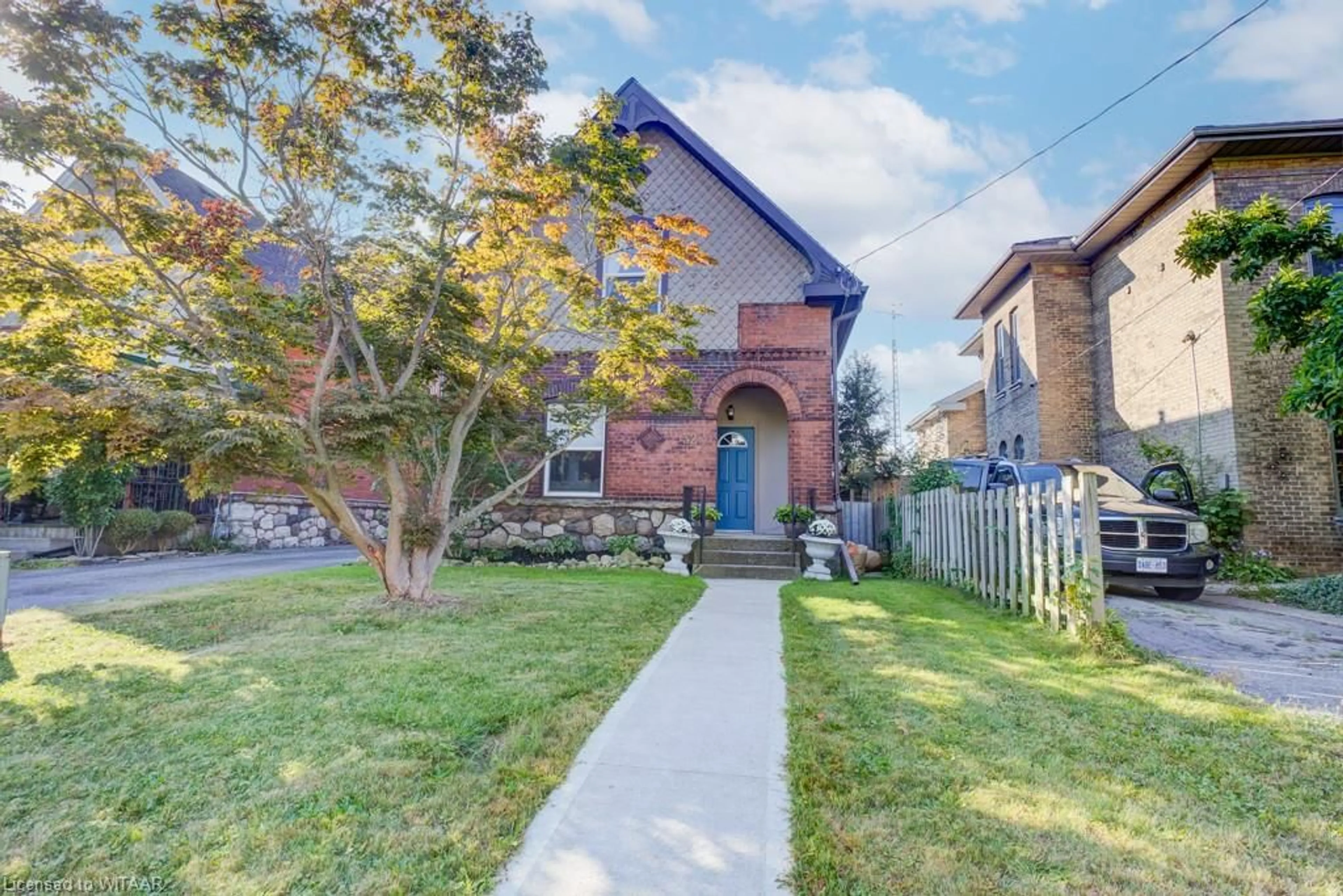 Frontside or backside of a home, the street view for 32 Park Ave, Brantford Ontario N3S 5H3