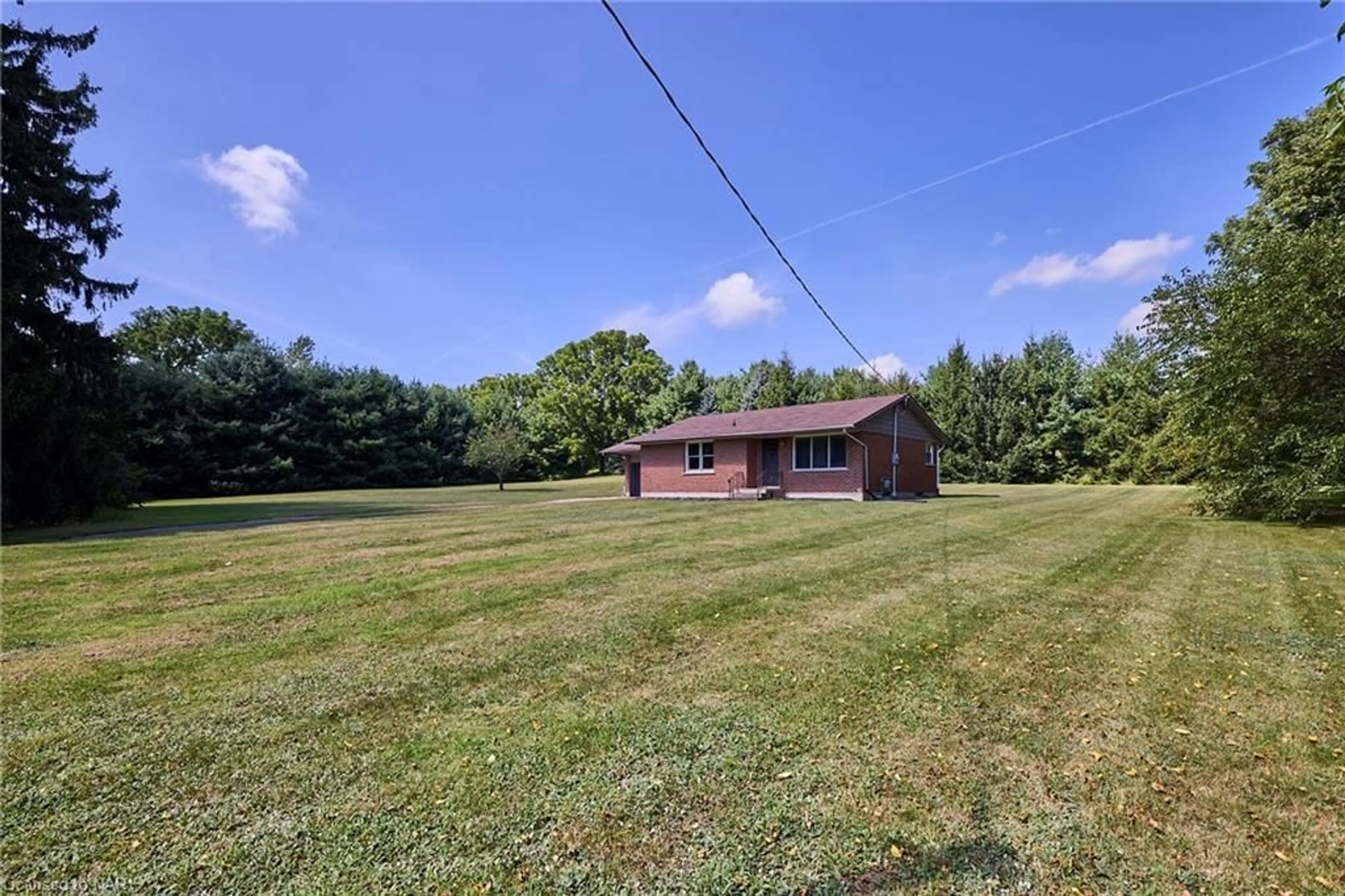 Frontside or backside of a home, the fenced backyard for 489 Memorial Dr, Fenwick Ontario L0S 1C0