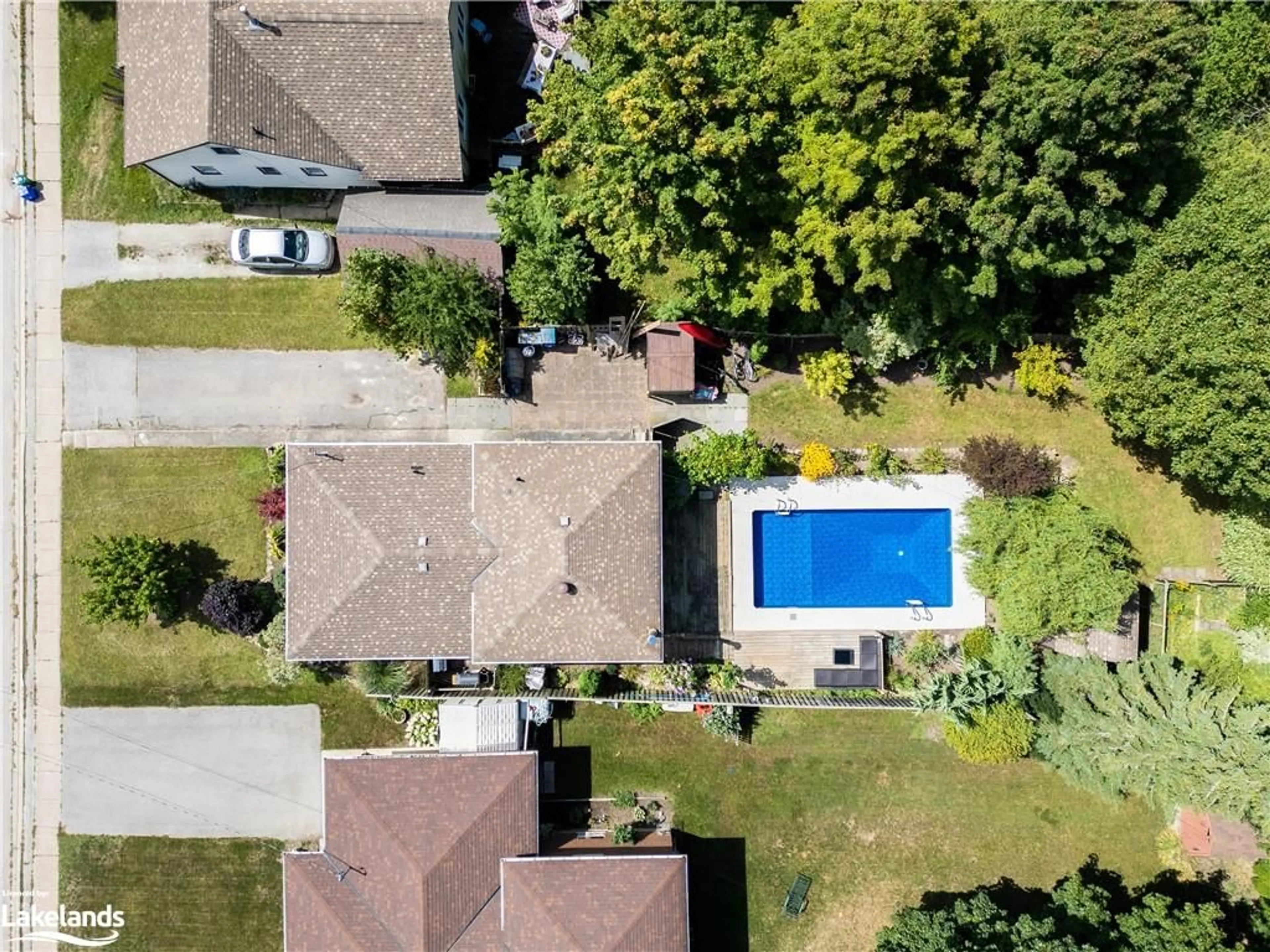 Frontside or backside of a home, the fenced backyard for 44 Parker St, Meaford Ontario N4L 1P2